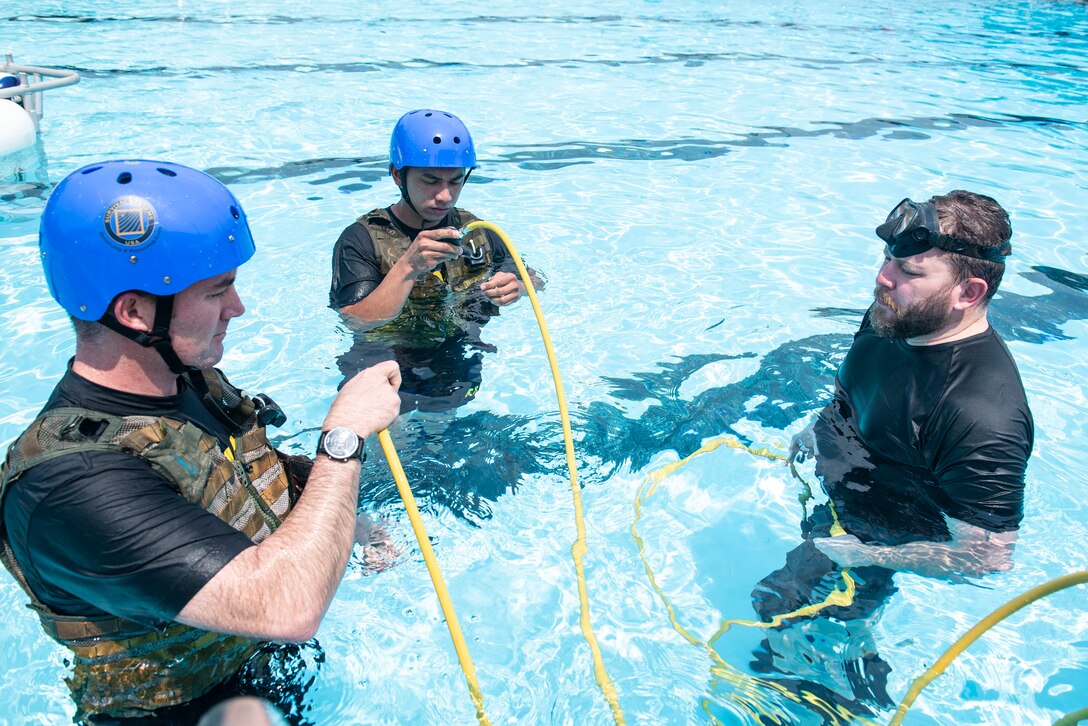 U.S. Soldiers assigned to the 228th Aviation Regiment perform water survival training at Soto Cano Air Base, March 25, 2019.