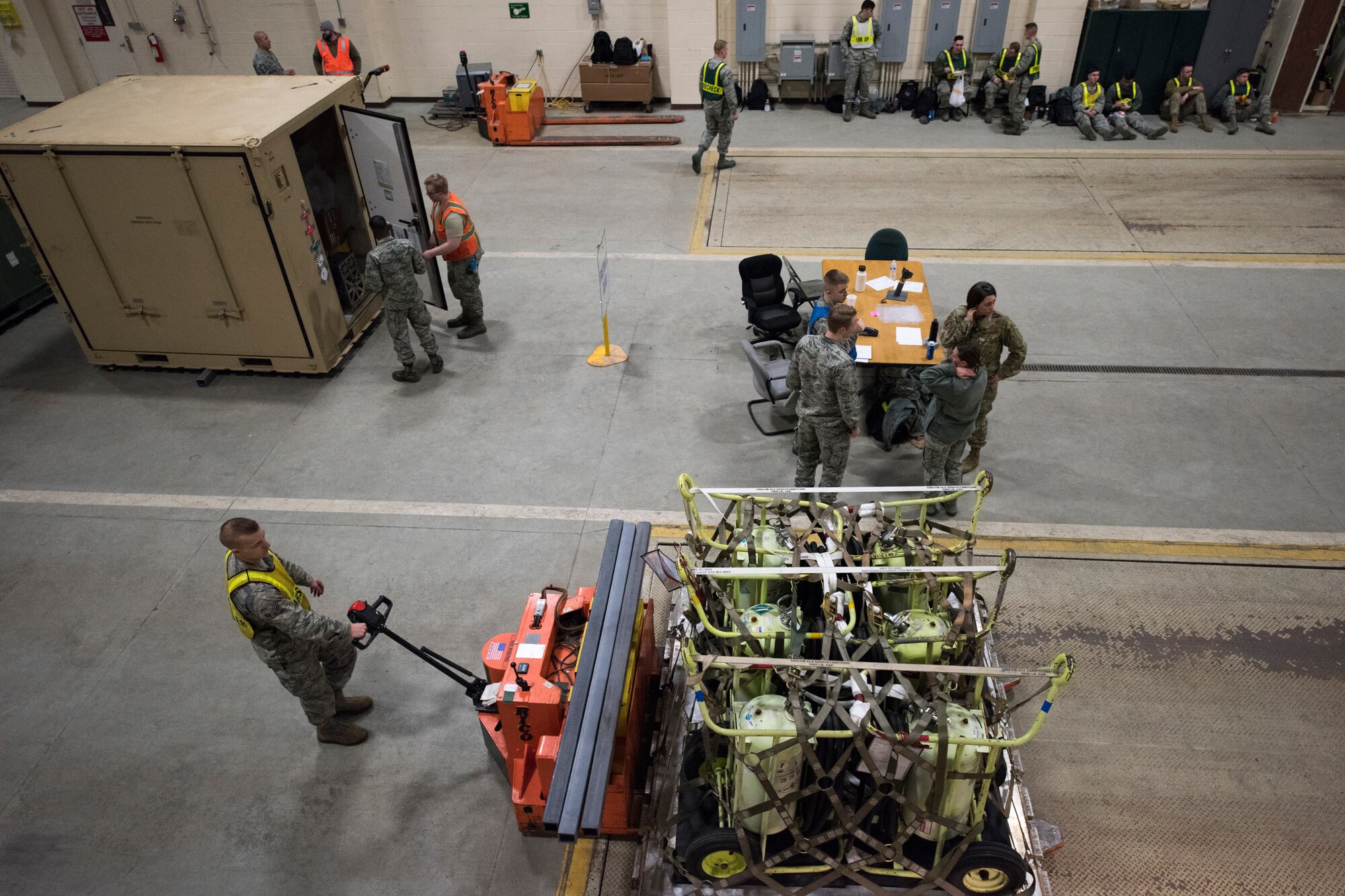 Airmen process pallets during Polar Force 19-4 at Joint Base Elmendorf-Richardson, Alaska, March 24, 2019. Polar Force is a two-week exercise designed to test JBER’s mission readiness. Exercises like this, strengthen and develop the skills service members require when facing adverse situations.