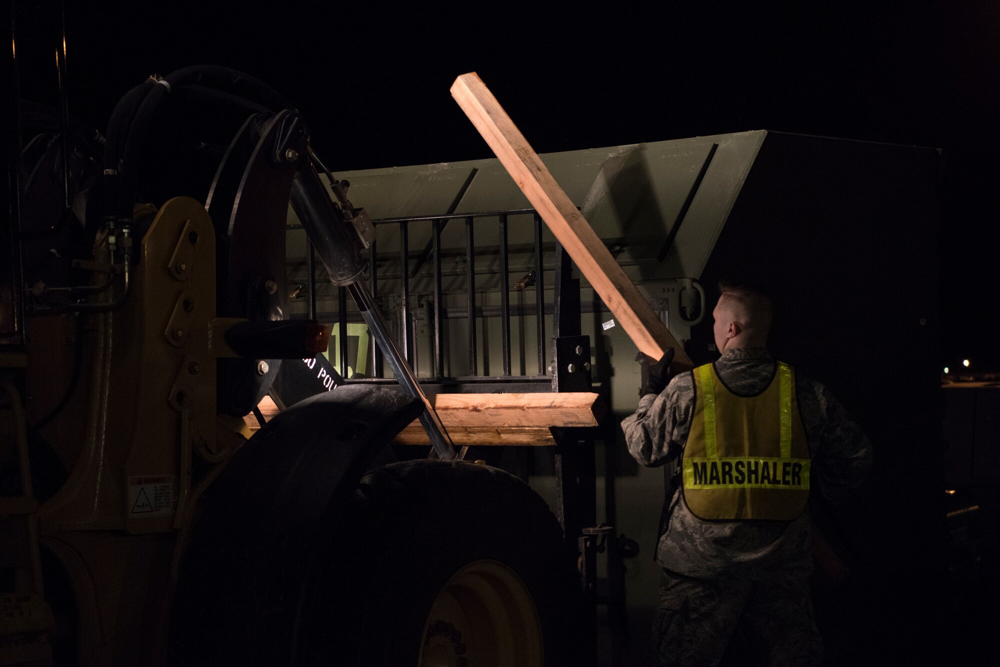 Airman 1st Class Cameron Black, 673d Logistics Readiness Squadron vehicle maintenance technician, places dunnage on a 10K all-terrain forklift during Polar Force 19-4 at Joint Base Elmendorf-Richardson, Alaska, March 25, 2019. Polar Force is a two-week exercise designed to test JBER’s mission readiness. Exercises like this strengthen and develop the skills service members require when facing adverse situations.