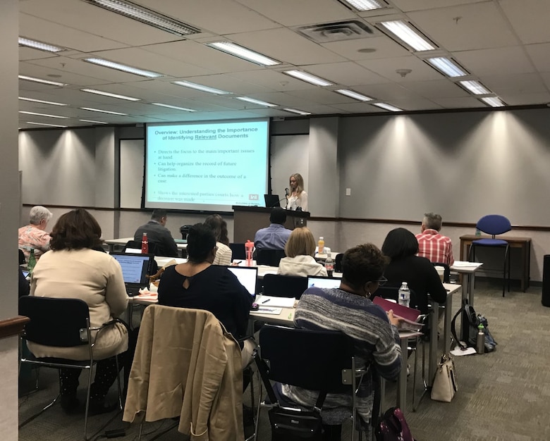 Lindsay Warner, a paralegal specialist with the Transatlantic Middle East District, gives a presentation on identifying relevant documents in legal discovery at the USACE worldwide paraprofessionals training.