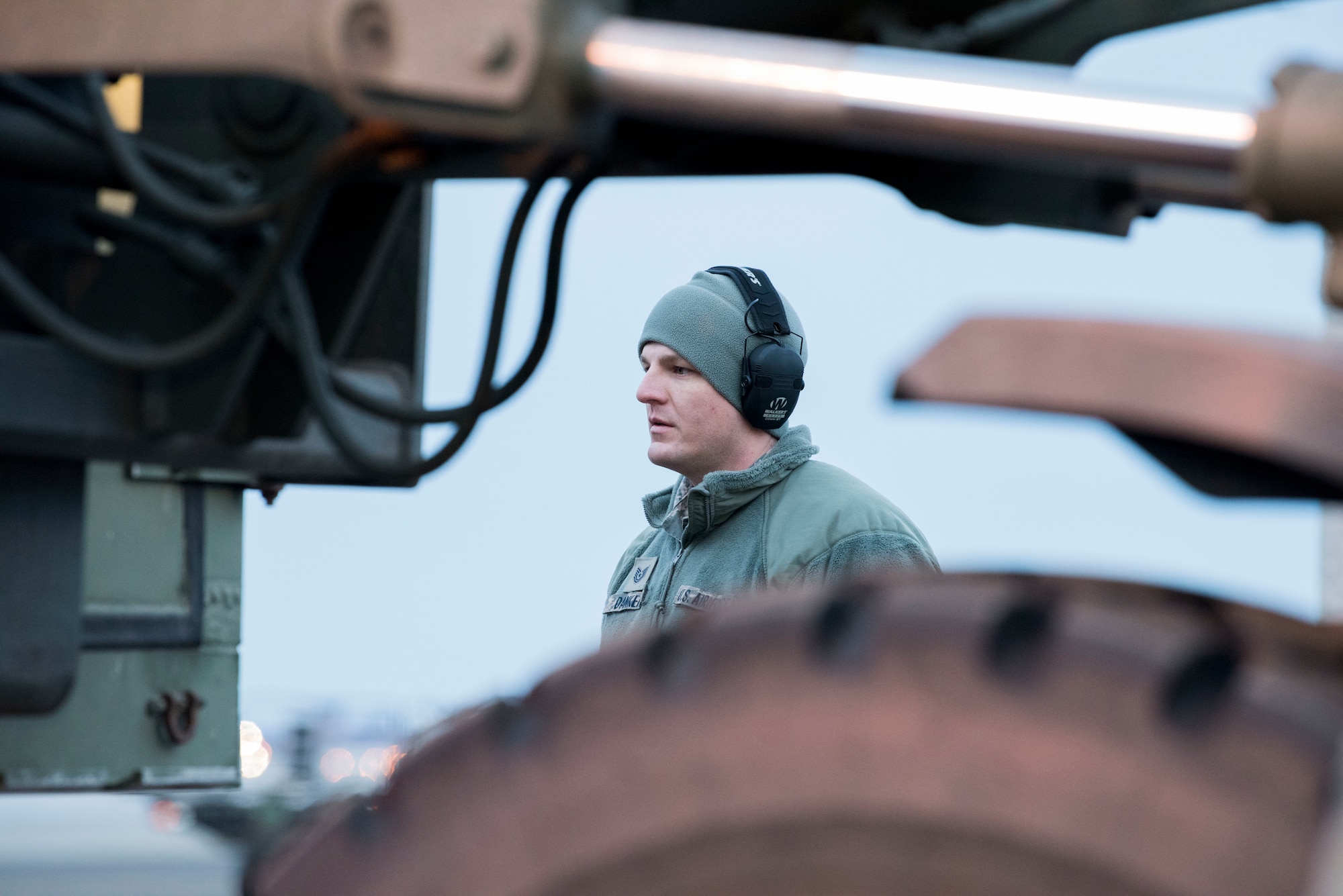 U.S. Air Force Tech. Sgt. Derrick Danker, 185th Air Refueling Wing Aerial Transportation Craftsman assigned to Iowa Air National Guard, supervises cargo movement outside the Joint Mobility Complex during Polar Force 19-4 at Joint Base Elmendorf-Richardson, Alaska, March 25, 2019. Polar Force is a two-week exercise designed to test JBER’s mission readiness, and develops the skills service members require to face adverse situations.