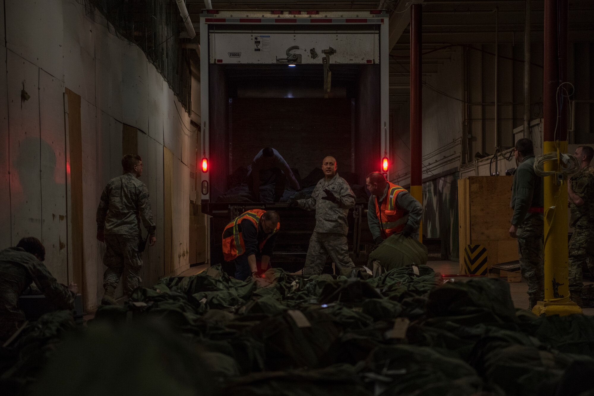 U.S. Air Force Senior Master Sgt. Nabbile Sanchez, 673d Logistics Readiness Squadron materiel management superintendent, gives direction for simulated deployment cargo loading during Polar Force 19-4 at Joint Base Elmendorf-Richardson, Alaska, March 25, 2019. Polar Force is a two-week exercise designed to test JBER’s mission readiness. Exercises like this strengthen and develop the skills service members require when facing adverse situations.