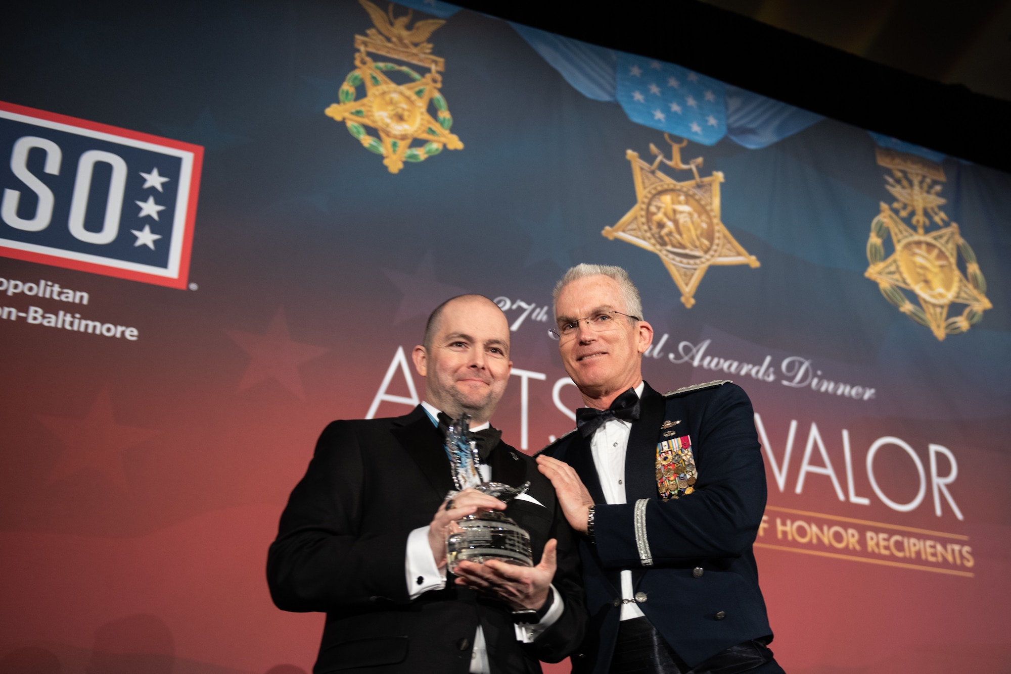Air Force Gen. Paul J. Selva, vice chairman of the Joint Chiefs of Staff, thanks Former Army Staff Sgt. Ronald Shurer II, an Afghanistan War on Terror Medal of Honor Recipient, during the USO Metropolitan Washington – Baltimore 37th Annual Awards Dinner, March 26, 2019, in Washington, D.C. This year’s theme saluted Medal of Honor Recipients.