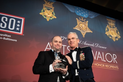 Air Force Gen. Paul J. Selva, vice chairman of the Joint Chiefs of Staff, thanks Former Army Staff Sgt. Ronald Shurer II, an Afghanistan War on Terror Medal of Honor Recipient, during the USO Metropolitan Washington – Baltimore 37th Annual Awards Dinner, March 26, 2019, in Washington, D.C. This year’s theme saluted Medal of Honor Recipients.