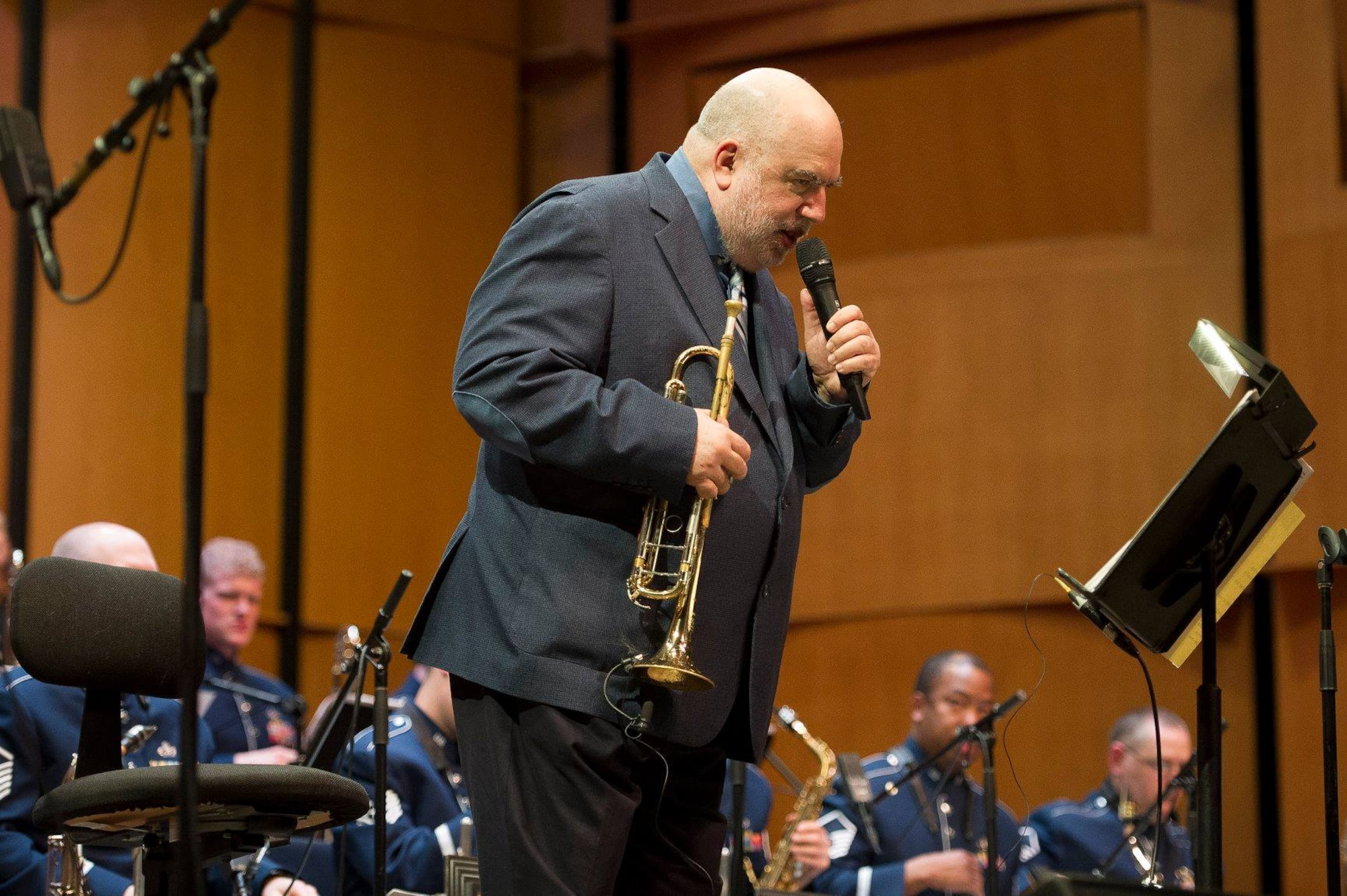 Jazz trumpeter and composer Randy Brecker gives the back story of one of his hits during a Jazz Heritage Series concert at the Rachel M. Schlesinger Concert Hall and Arts Center on the Northern Virginia Community College campus in Alexandria, Va., March 22, 2019. (U.S. Air Force photo by Master Sgt. Michael B. Keller)