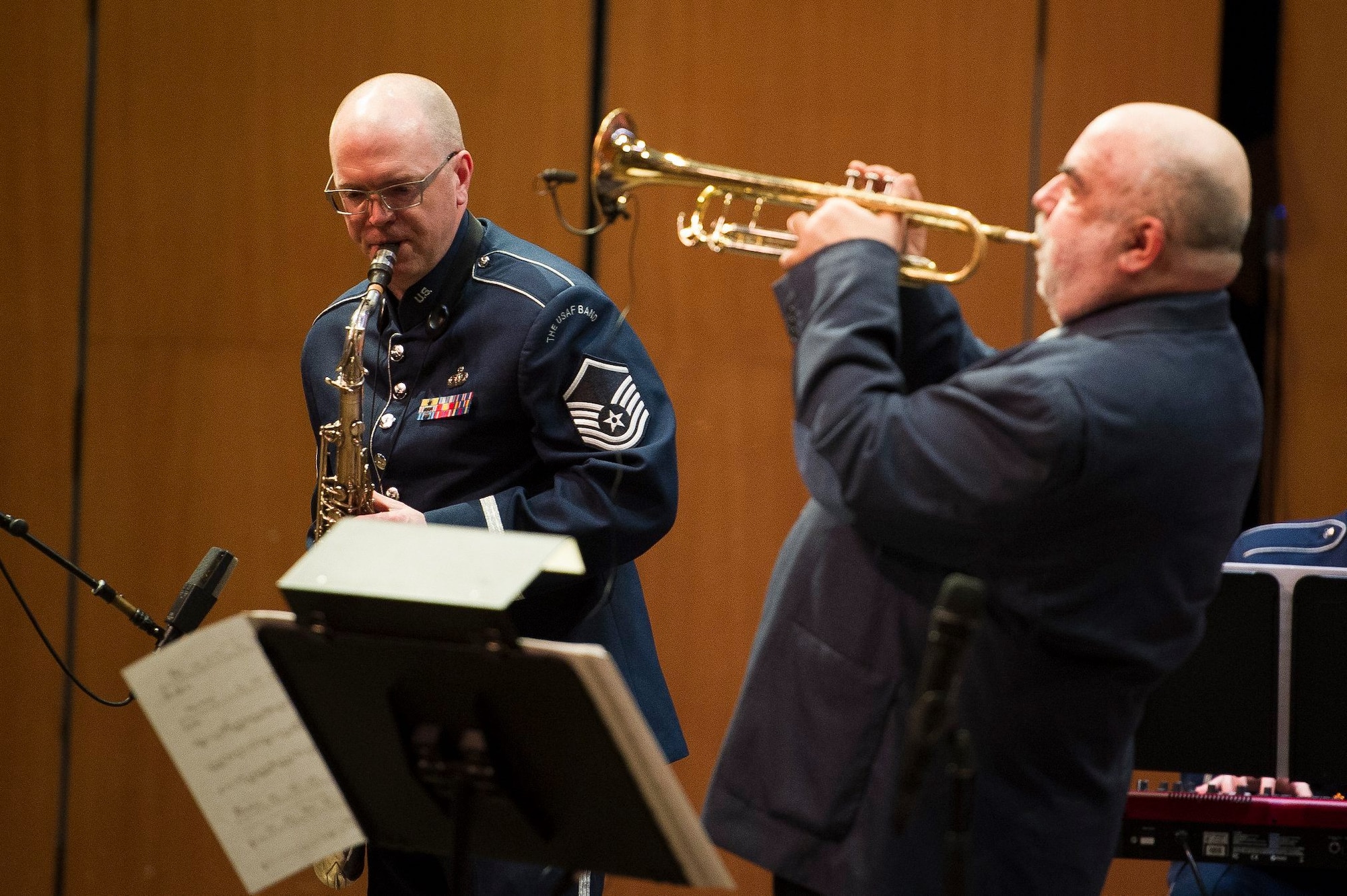 Master Sgt. Tedd Baker, Airmen of Note tenor saxophonist, left, performs with guest trumpeter Randy Brecker at the Rachel M. Schlesinger Concert Hall and Arts Center on the Northern Virginia Community College campus in Alexandria, Va., March 22, 2019. (U.S. Air Force photo by Master Sgt. Michael B. Keller)