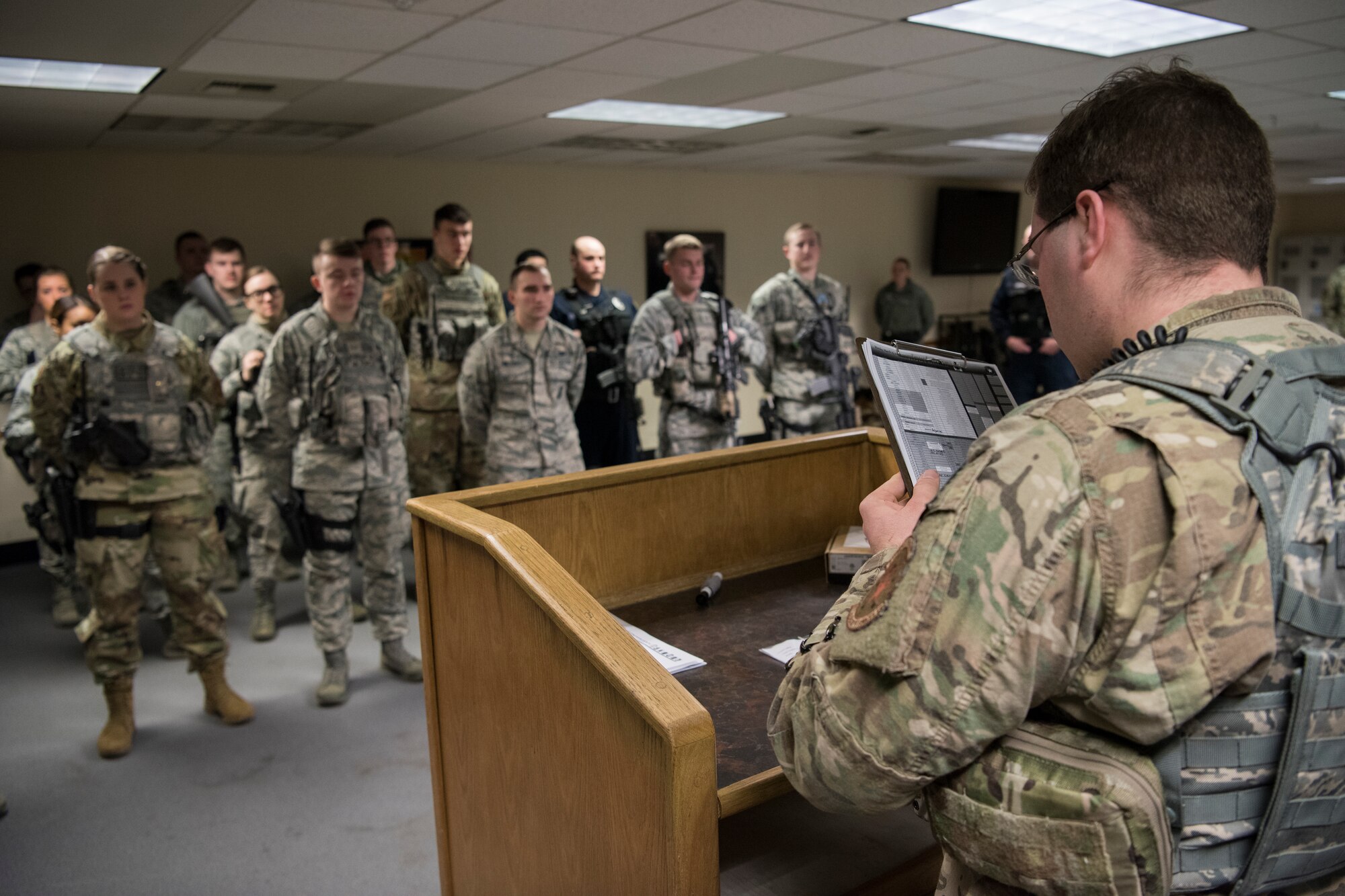 U.S. Air Force Tech. Sgt. Seth Thornton, 673d Security Forces Squadron flight sergeant, conducts a guard mount for a security forces augmentee shift change during Polar Force 19-4 at JBER, Alaska, March 26, 2019. Polar Force is a two-week exercise designed to test JBER’s mission readiness. Exercises like this strengthen and develop the skills service members require when facing adverse situations.