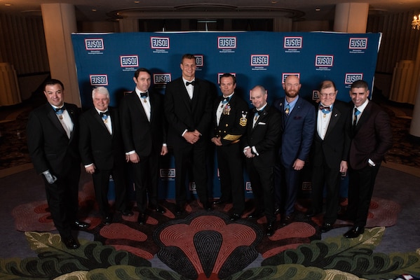 Rob Gronkowski, three-time Super Bowl champion, poses for a photo with multiple Medal of Honor Recipients before the USO Metropolitan Washington – Baltimore 37th Annual Awards Dinner, March 26, 2019, in Washington, D.C. This year’s theme saluted Medal of Honor recipients.