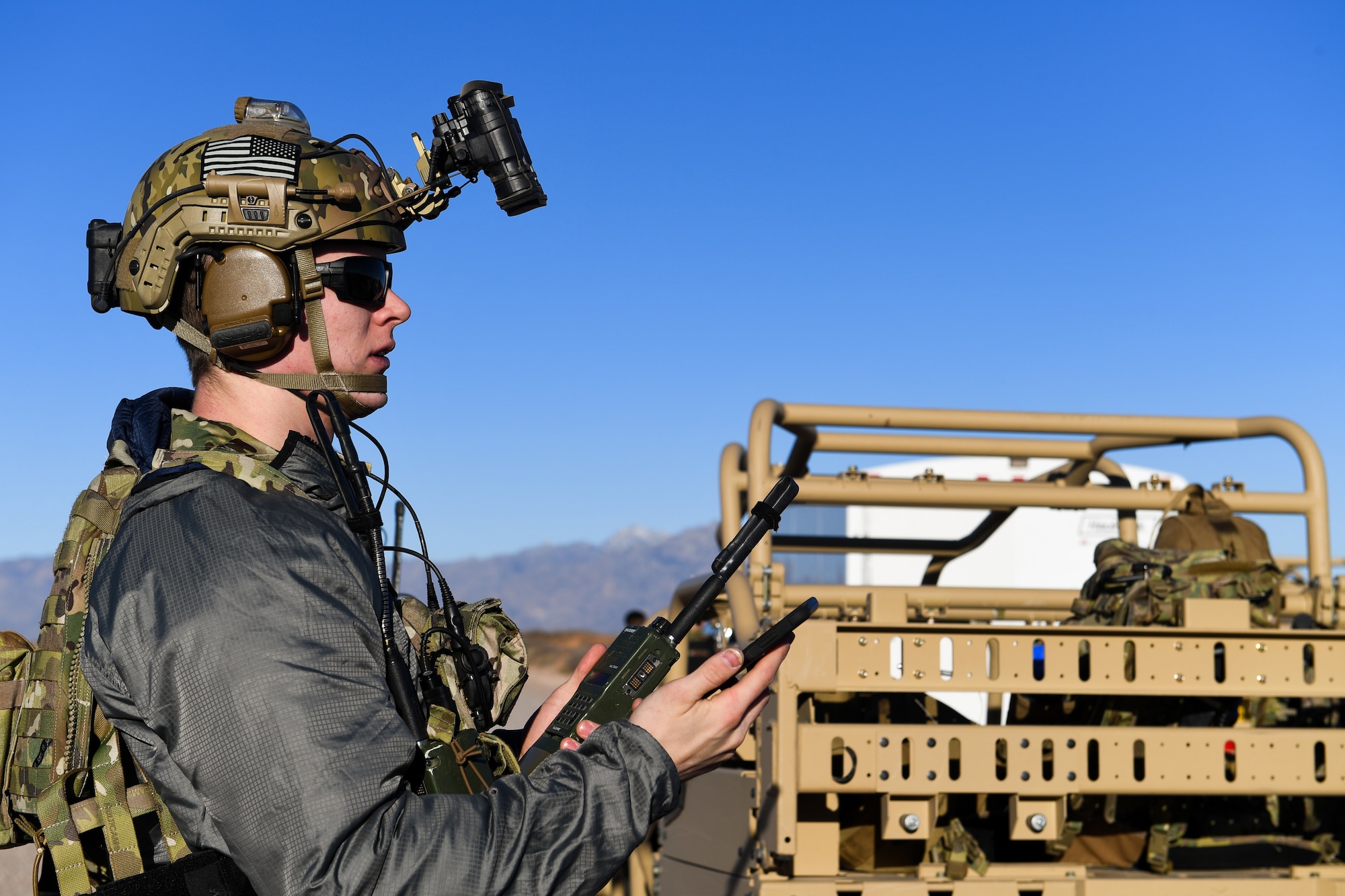 U.S. Air Force 2nd Lt. William, 351st Special Warfare Training Squadron combat rescue officer student, trains with tactical air control party members, assigned to the 7th Air Support Operations Squadron, on calling in close air support and nine lines on Red Rio Range, N.M., March 14, 2019. The CROs and TACPs worked with MQ-9 Reapers from Holloman Air Force Base, N.M., to simulate real world scenarios and improve communication with the pilots. Last names have been withheld due to operational security restraints.(U.S. Air Force photo by Senior Airman Haley D. Phillips)