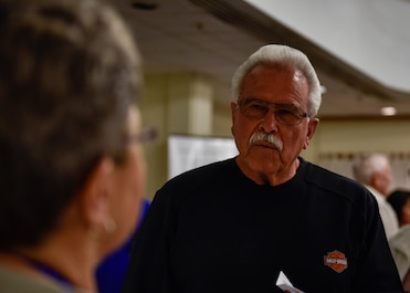 Johnny Rael, U.S. Army retired, learns about medical benefits from the 377th Medical Group Health Benefits information table at Kirtland Air Force Base, N.M., March 27, 2019. Kirtland’s Retiree Activities Office hosted the military retiree appreciation day where information tables were available to retirees to learn about benefits and resources accessible to them. (U.S. Air Force photo by Airman 1st Class Austin J. Prisbrey)