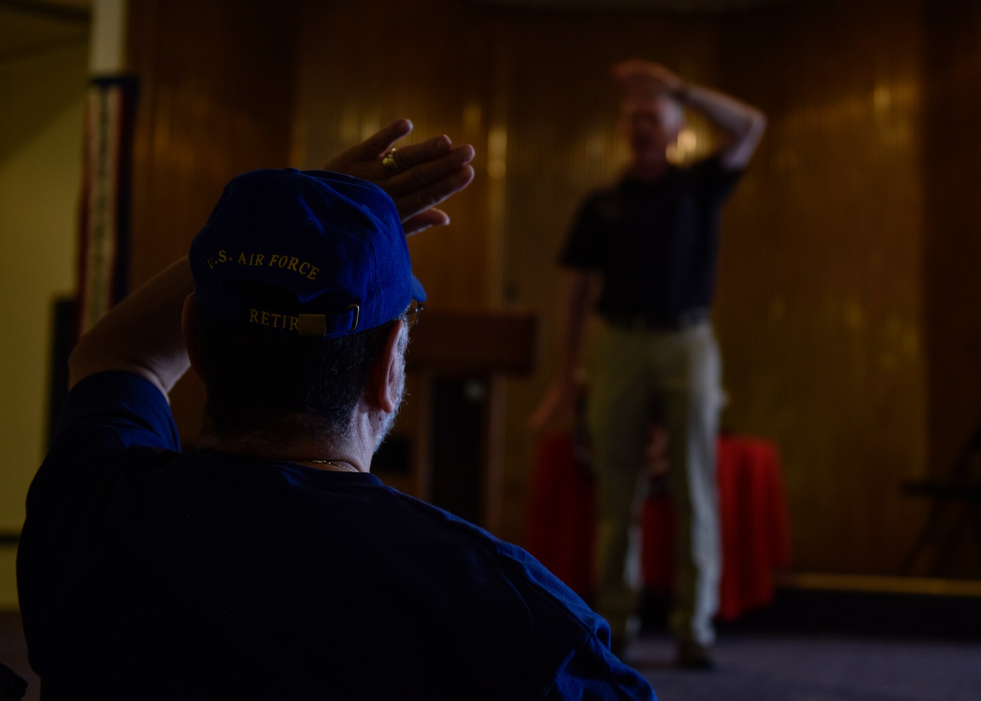 Guy Leahy, 377th Medical Group health promotion program coordinator, leads retirees in Tai Chi during military retiree appreciation day at Kirtland Air Force Base, N.M. March 27, 2019. Tai Chi is an ancient form of exercise that improves muscle strength and flexibility. (U.S. Air Force photo by Airman 1st Class Austin J. Prisbrey)