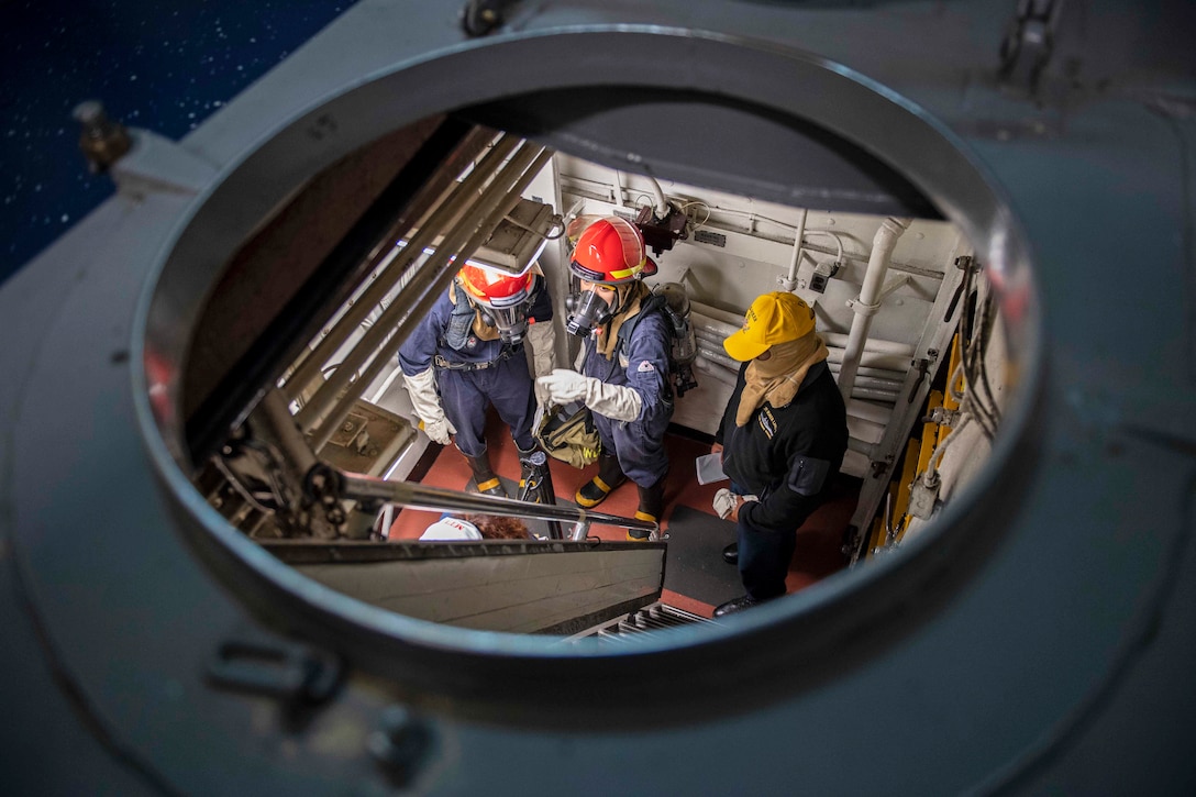 Three sailors are visible through a circular opening above them on a ship.