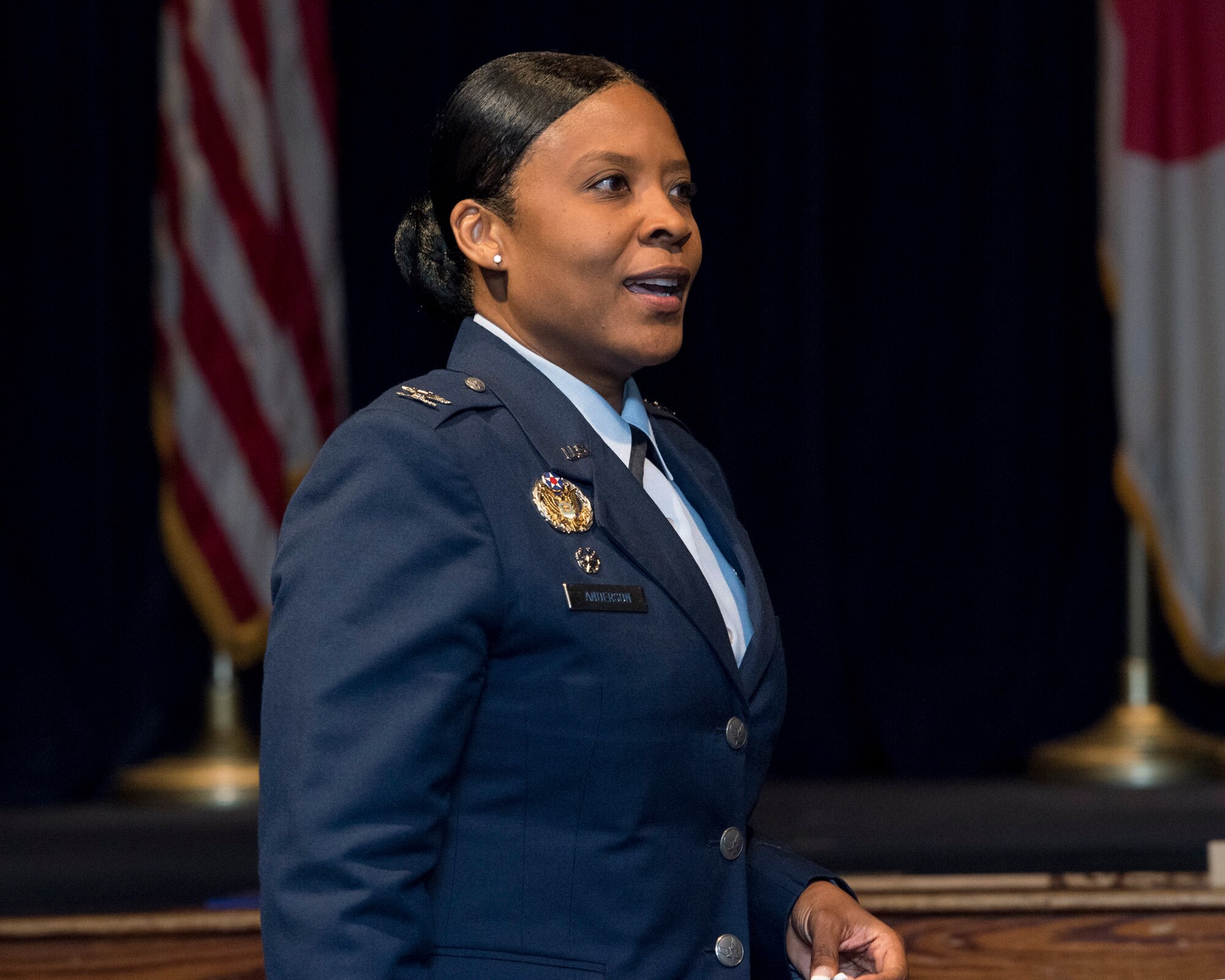 Col. Tanya J. Anderson, 374th Mission Support Group commander, gives a presentation to audience during Women's History Month luncheon at Yokota Air Base, Japan, 26 March, 2019.