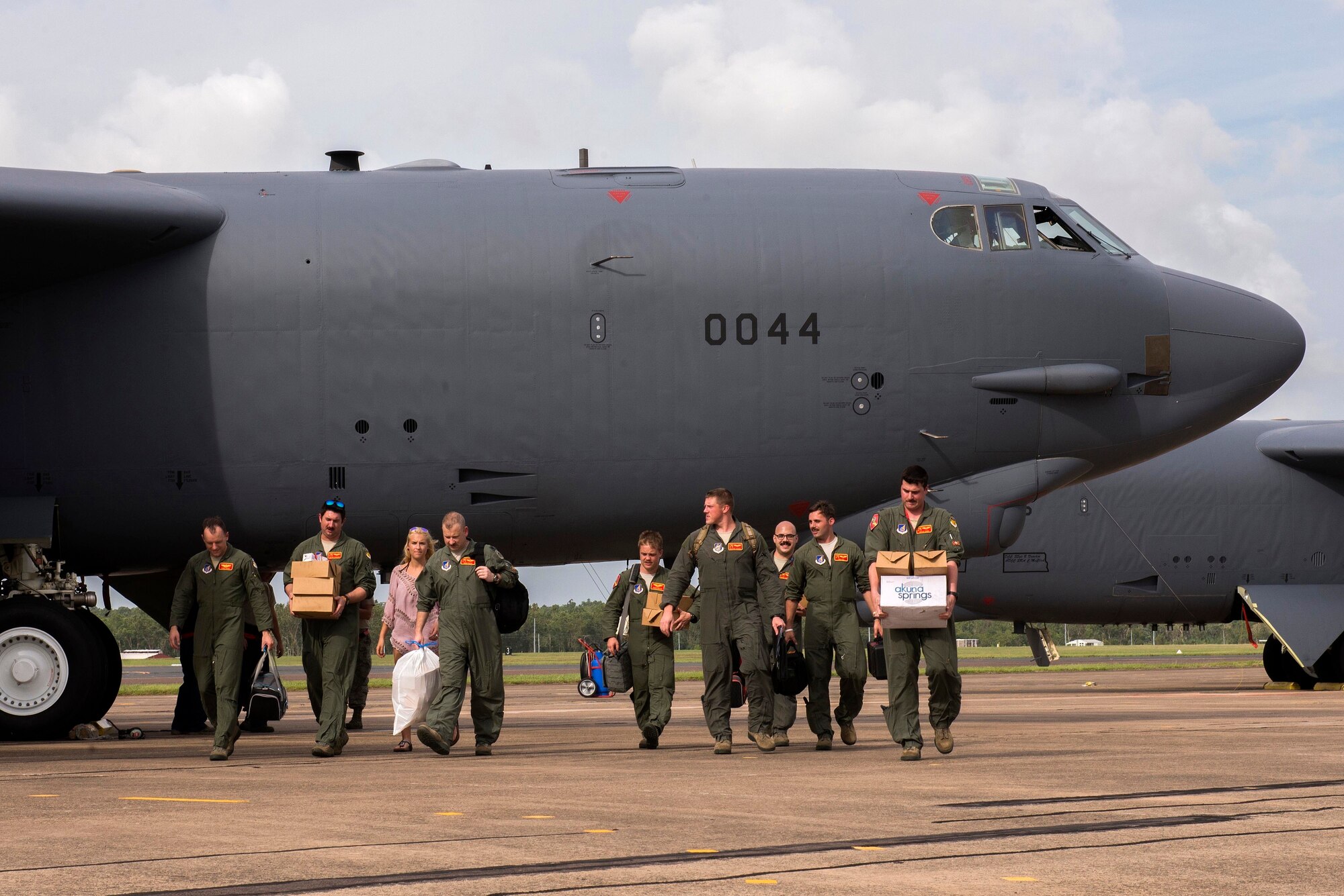 U.S. Airmen assigned to the 23rd Expeditionary Bomb Squadron help pilots and aircrew members unload a B-52 Stratofortress following a sortie in support of Diamond Shield 2019 (DS-19) at Royal Australian Air Force Base Darwin, Australia, March 26, 2019.