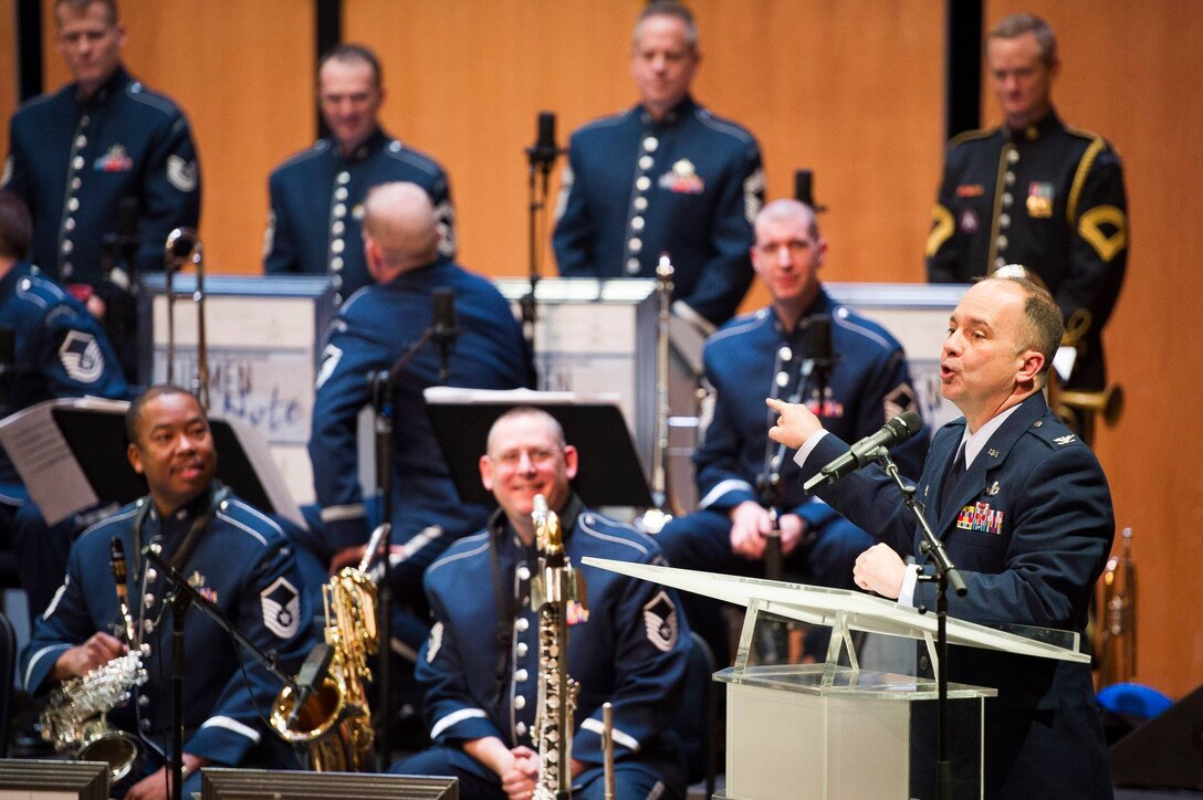 Col. Don Schofield, U.S. Air Force Band commander and conductor, introduces the Band's premier jazz ensemble, Airmen of Note, at the Rachel M. Schlesinger Concert Hall and Arts Center on the Northern Virginia Community College campus in Alexandria, Va., March 22, 2019. (U.S. Air Force photo by Master Sgt. Michael B. Keller)