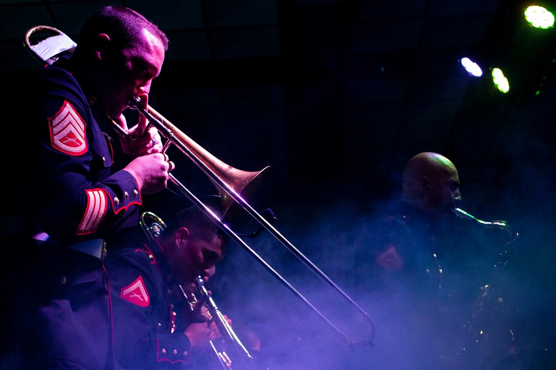 U.S. Marines with the Marine Corps Forces, Pacific band perform on stage at Marine Corps Base Hawaii, Mar. 26, 2019. The performance served as a dress rehearsal for the Marine Corps Forces, Pacific brass and rock band as well as entertain family, friends, and guests.