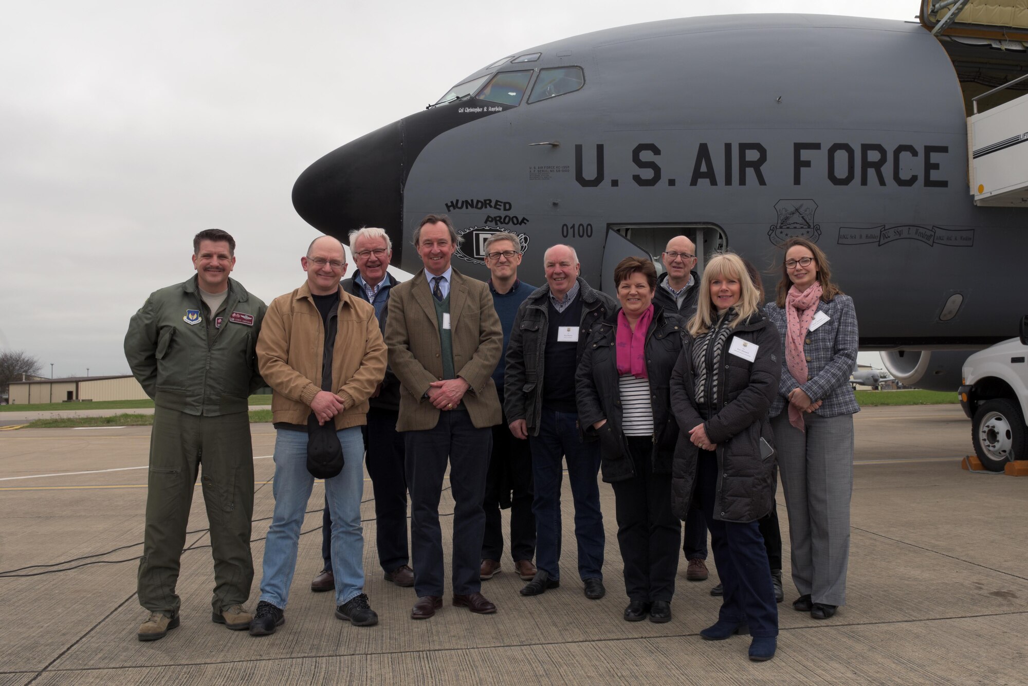 U.S. Air Force Col. Christopher Amrhein, 100th Air Refueling Wing commander, poses for a picture with local civic leaders at RAF Mildenhall, England, March 20, 2019. The local guests were able fly on a U.S. Air Force KC-135 Statotanker and observe in-flight refueling. (U.S. Air Force photo by Senior Airman Benjamin Cooper)