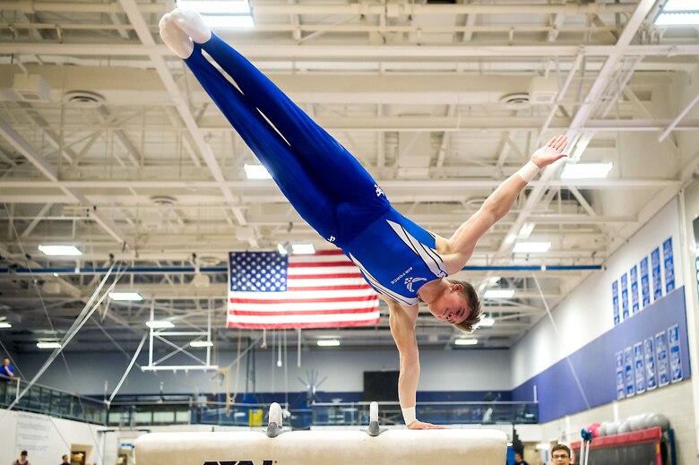 An Air Force Academy sophomore performs on the pommel horse