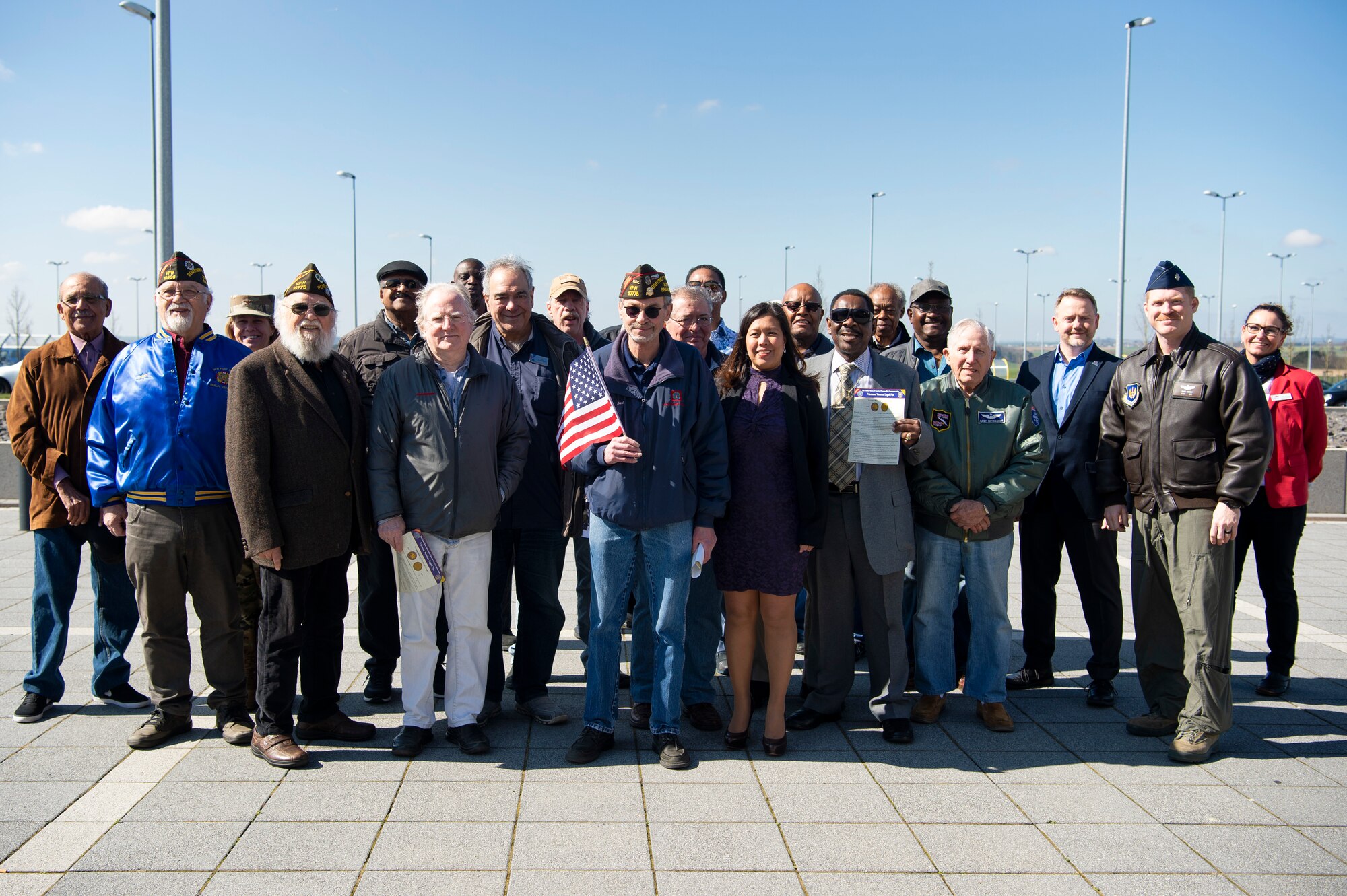 Spangdahlem Air Base leadership and veterans pose for a photo during the Vietnam War Veterans Commemoration at Spangdahlem Air Base, Germany, March 29, 2019. The ceremony was held to honor veterans and their families for their service and sacrifice. (U.S. Air Force photo by Airman 1st Class Valerie Seelye)