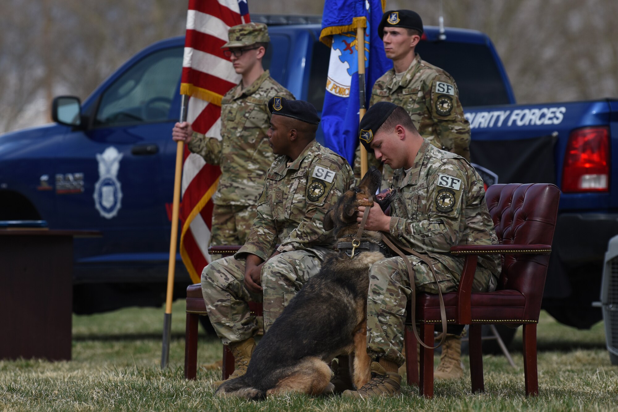 U.S. Air Force Staff Sgt. Austin Clark, 377th Security Forces Squadron military working dog handler, embraces MWD Boris after Boris’s retirement at Kirtland Air Force Base, N.M., March 26, 2019. Clark is in the process of adopting Boris. (U.S. Air Force photo by Senior Airman Eli Chevaler)