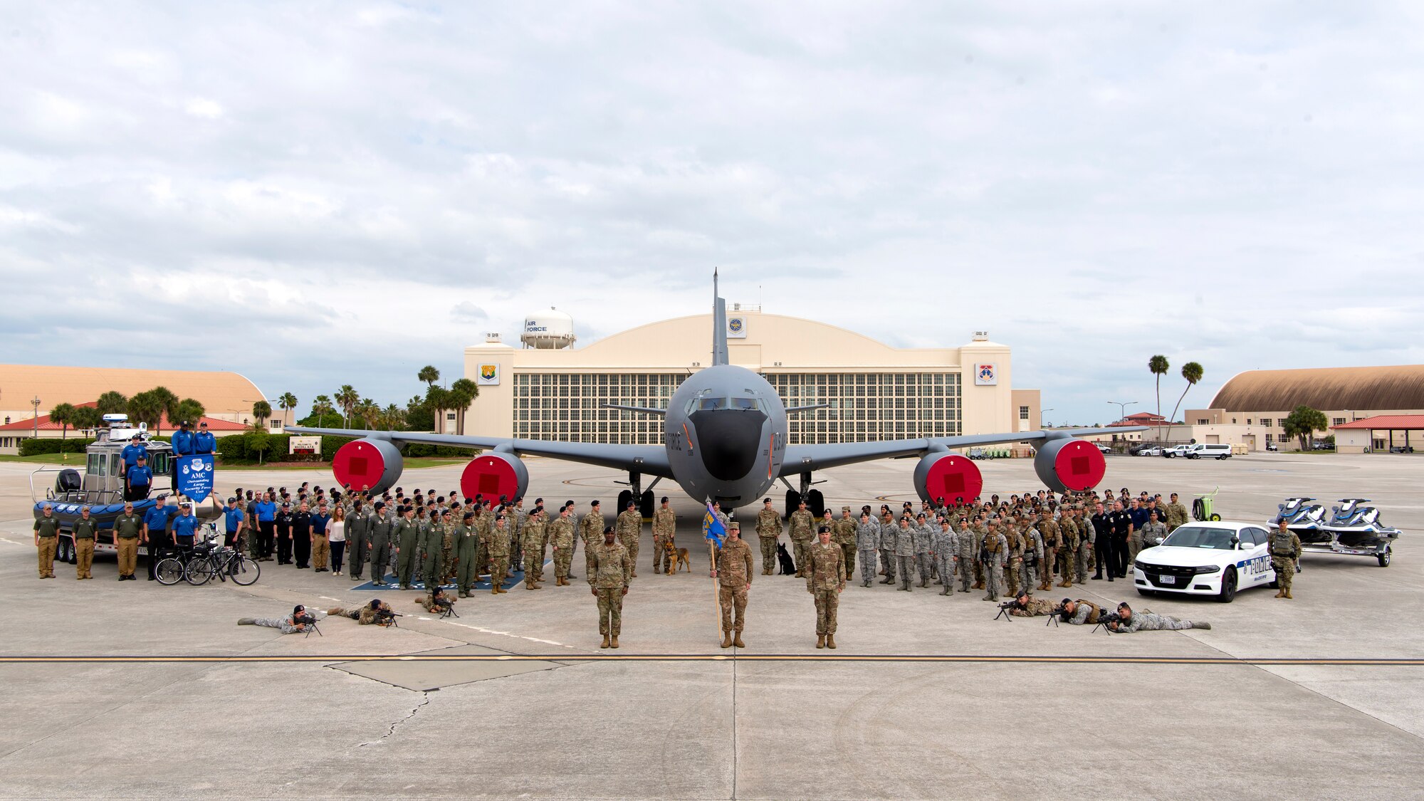 Members of the 6th Security Forces Squadron take a squadron photo in front of a KC-135 Stratotanker aircraft at MacDill Air Force Base, Fla., March 20, 2019. Security forces, the largest career field in the Air Force, is responsible for protecting and defending air bases around the globe.