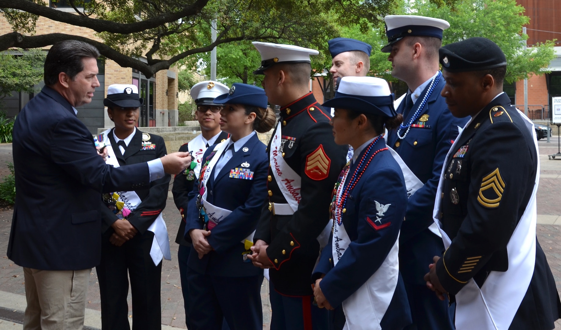 ABC news anchor Steve Spriester of KSAT 12 interviews the 2019 Joint Base San Antonio Military Ambassadors during Fiesta San Antonio media day March 27 at the Pearl Stable
in San Antonio. The 128th Fiesta San Antonio takes place April 18-28 and includes more than 100 events that showcase San Antonio's rich multicultural heritage. Fiesta began in 1891 to honor the heroes of the Battles of the Alamo and San Jacinto. Two service members representing each military service serve as military ambassadors and take part in more than 50 Fiesta events.