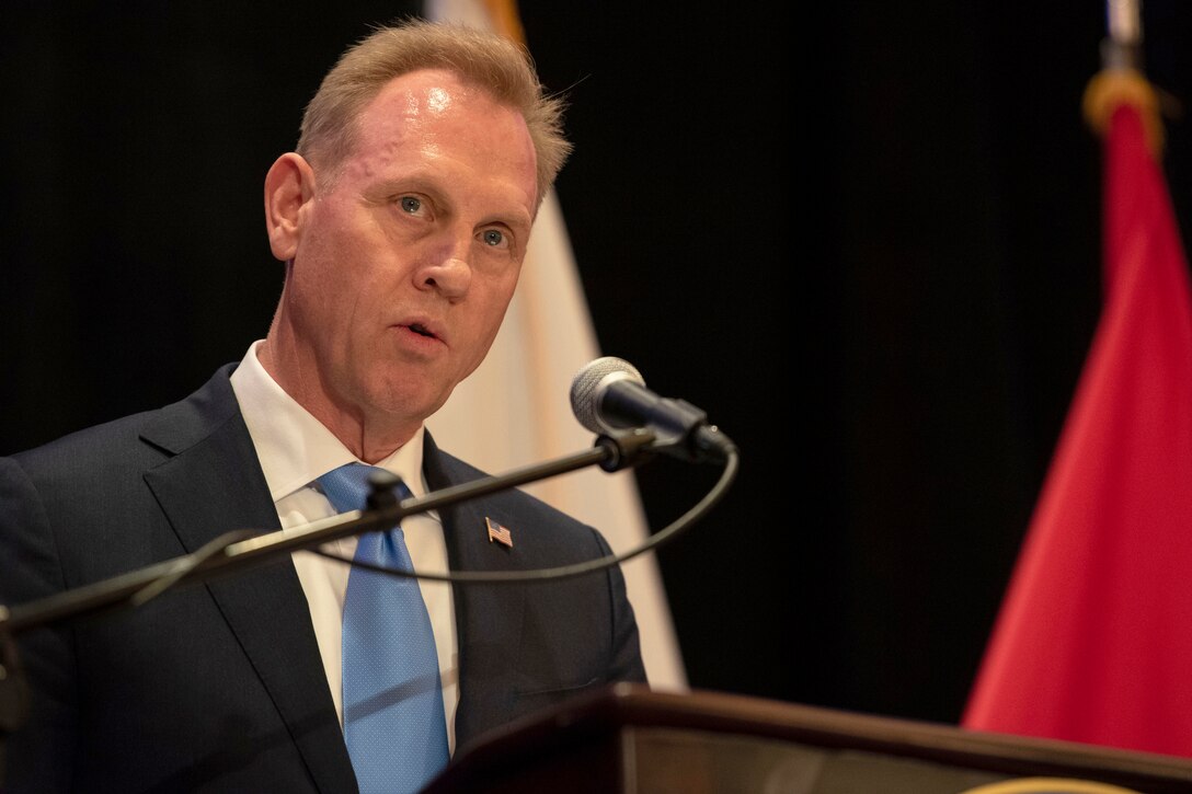 Acting Defense Secretary Patrick M. Shanahan speaks from behind a podium.