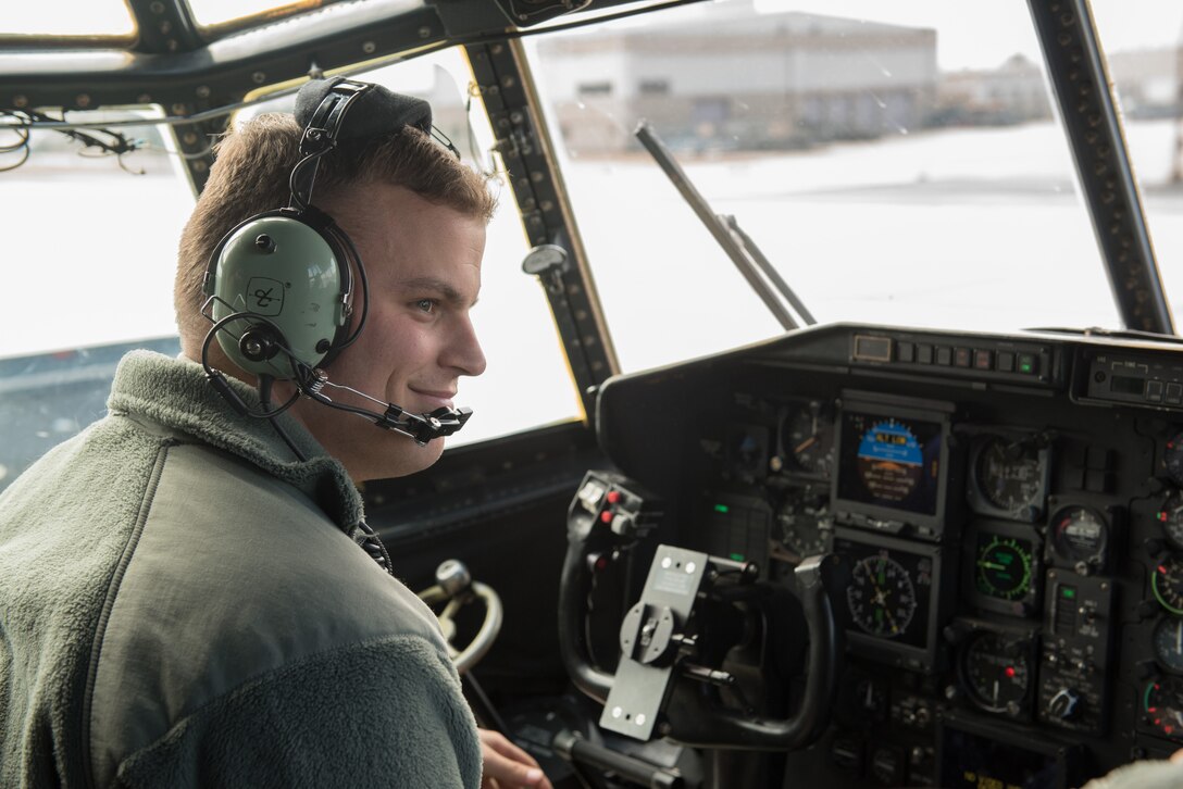 Airman working on aircraft.