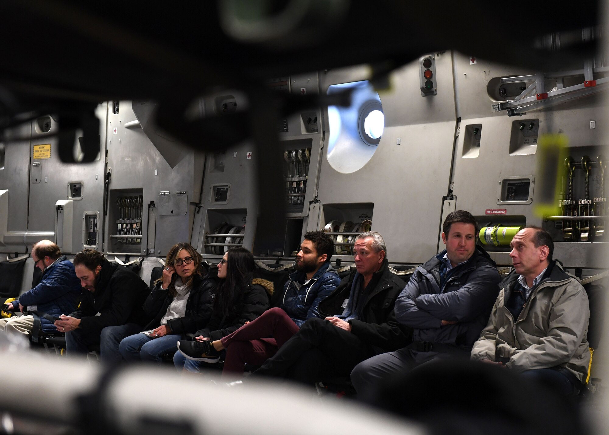 Alumni of Leadership Pittsburgh Inc. programs sit in seats as a C-17 Globemaster III aircraft descends back into Pittsburgh near the Pittsburgh International Airport Air Reserve Station, Pennsylvania, March 22, 2019. During the hour-long civic leader flight the alumni explored the plane, spoke with Airmen, and toured the cockpit. (U.S. Air Force photo by Senior Airman Grace Thomson)