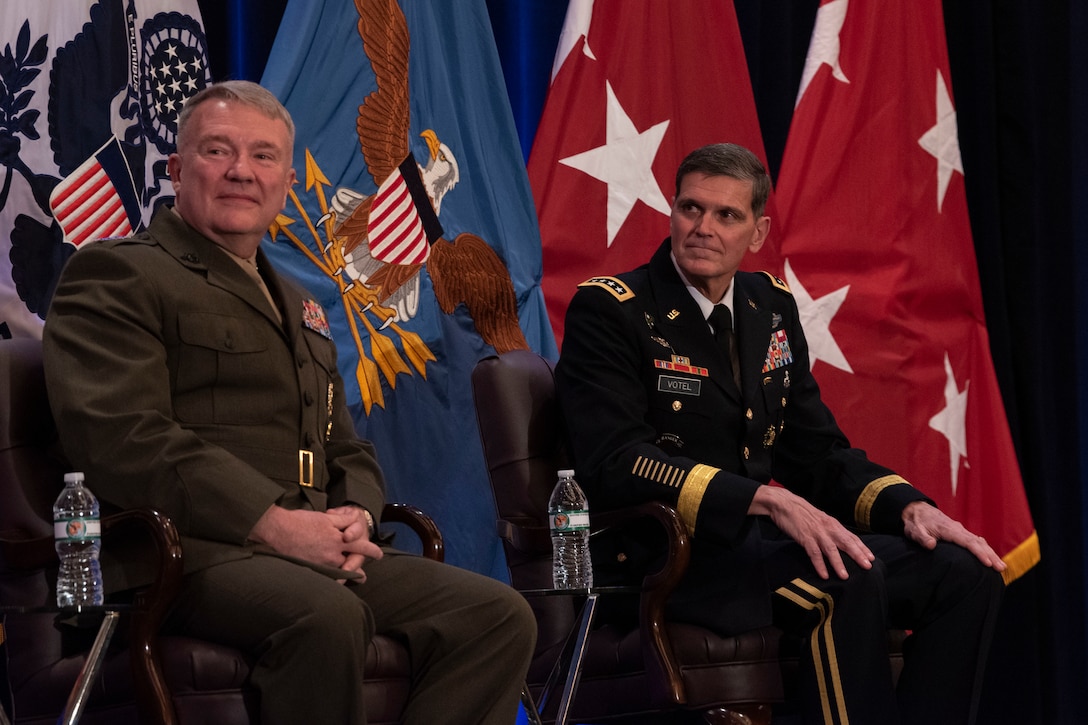 The incoming commander of U.S. Central Command, U.S. Marine Corps Gen. Kenneth F. McKenzie Jr. ,left, and the outgoing CENTCOM commander, U.S. Army Gen. Joseph L. Votel, are seen at the CENTCOM change of command, March 28, 2019. Army Gen. Joseph L. Votel was relieved by Marine Corps Gen. Kenneth McKenzie, who previously served as the Director of the Joint Staff. (DoD photo by Lisa Ferdinando)