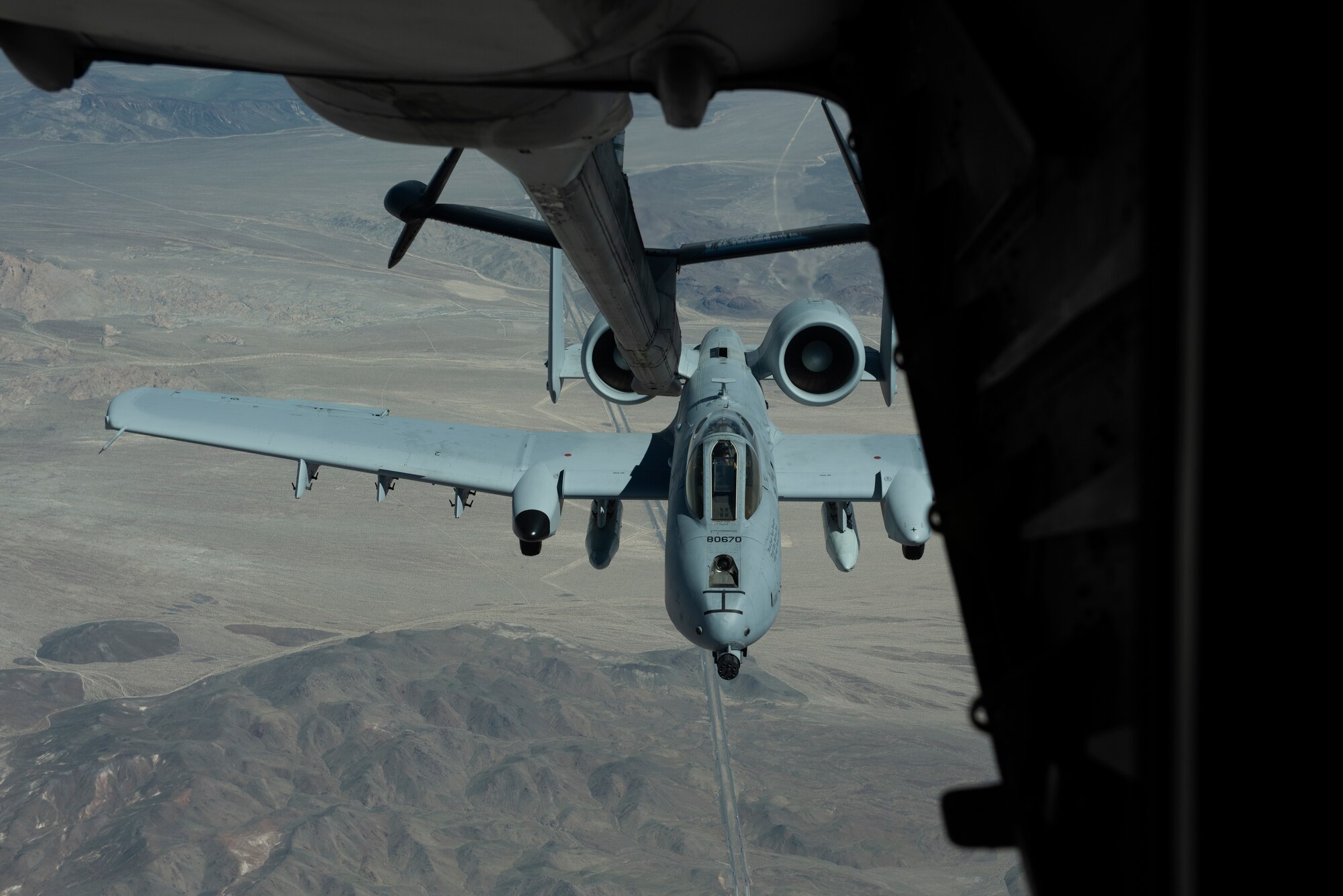 An A-10 Thunderbolt II from Davis-Monthan Air Force Base, Arizona, is refueled by a KC-10 Extender assigned to Travis Air Force Base, California March 28, 2019 over Southern California. The KC-10 also refueled a Boeing E-3 Sentry offloading more than 19,000 pounds of fuel. All three aircraft will be featured at the Thunder Over the Bay Air Show at Travis March 30-31. (U.S. Air Force photo by Tech. Sgt. James Hodgman)