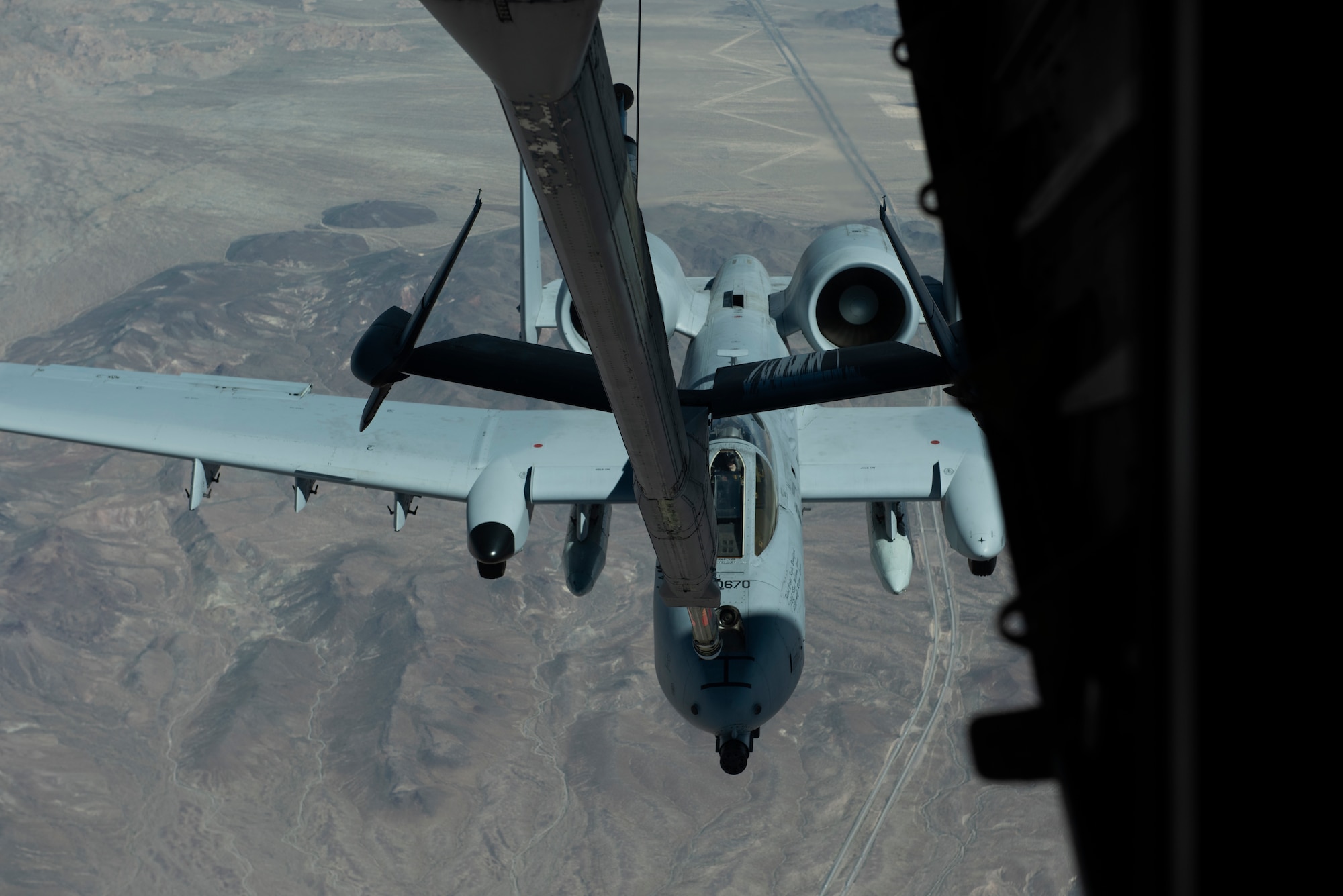 An A-10 Thunderbolt II from Davis-Monthan Air Force Base, Arizona, flies into position to be refueled by a KC-10 Extender assigned to Travis Air Force Base, California March 28, 2019 over Southern California. The KC-10 also refueled a Boeing E-3 Sentry, offloading more than 19,000 pounds of fuel. All three aircraft will be featured at the Thunder Over the Bay Air Show at Travis March 30-31. (U.S. Air Force photo by Tech. Sgt. James Hodgman)