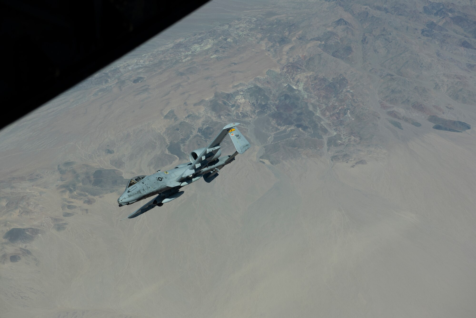 An A-10 Thunderbolt II from Davis-Monthan Air Force Base, Arizona, flies over Southern California March 28, 2019 after being refueled by a KC-10 Extender assigned to Travis Air Force Base, California. The KC-10 also refueled a Boeing E-3 Sentry, offloading more than 19,000 pounds of fuel. All three aircraft will be featured at the Thunder Over the Bay Air Show at Travis March 30-31. (U.S. Air Force photo by Tech. Sgt. James Hodgman)