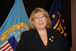 Karen Goodburlet, DLA Troop Support Medical purchasing agent, poses for a photo during a retirement ceremony in her honor March 28, 2019 in Philadelphia.