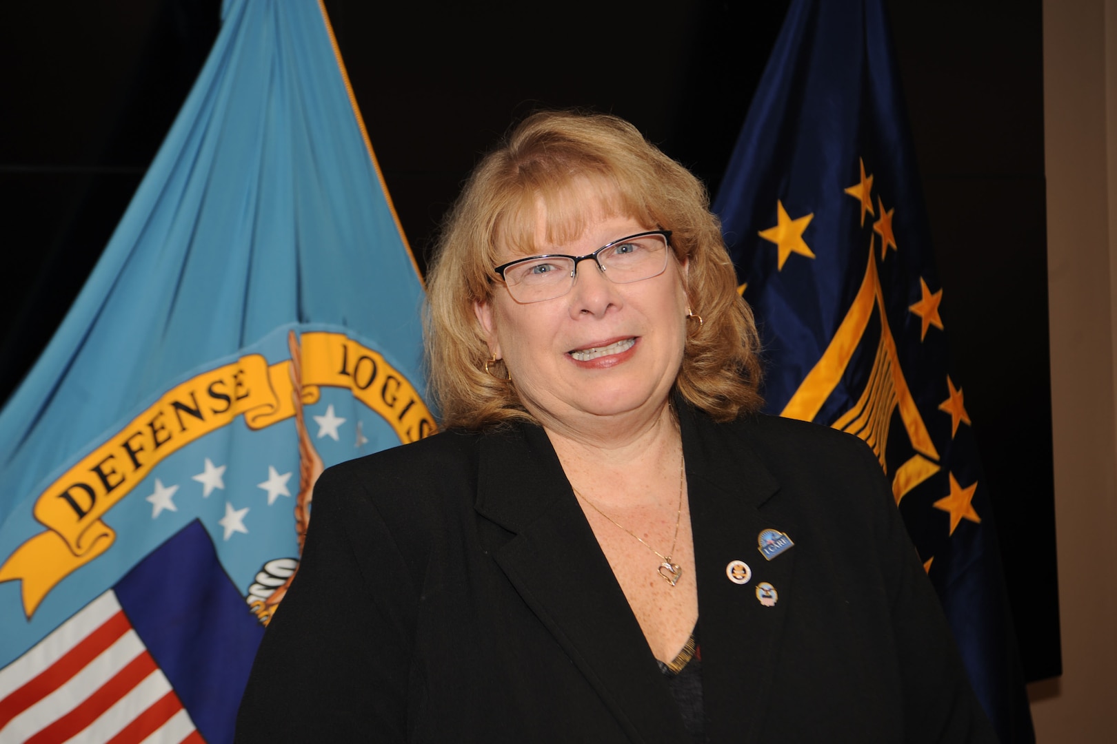 Karen Goodburlet, DLA Troop Support Medical purchasing agent, poses for a photo during a retirement ceremony in her honor March 28, 2019 in Philadelphia.