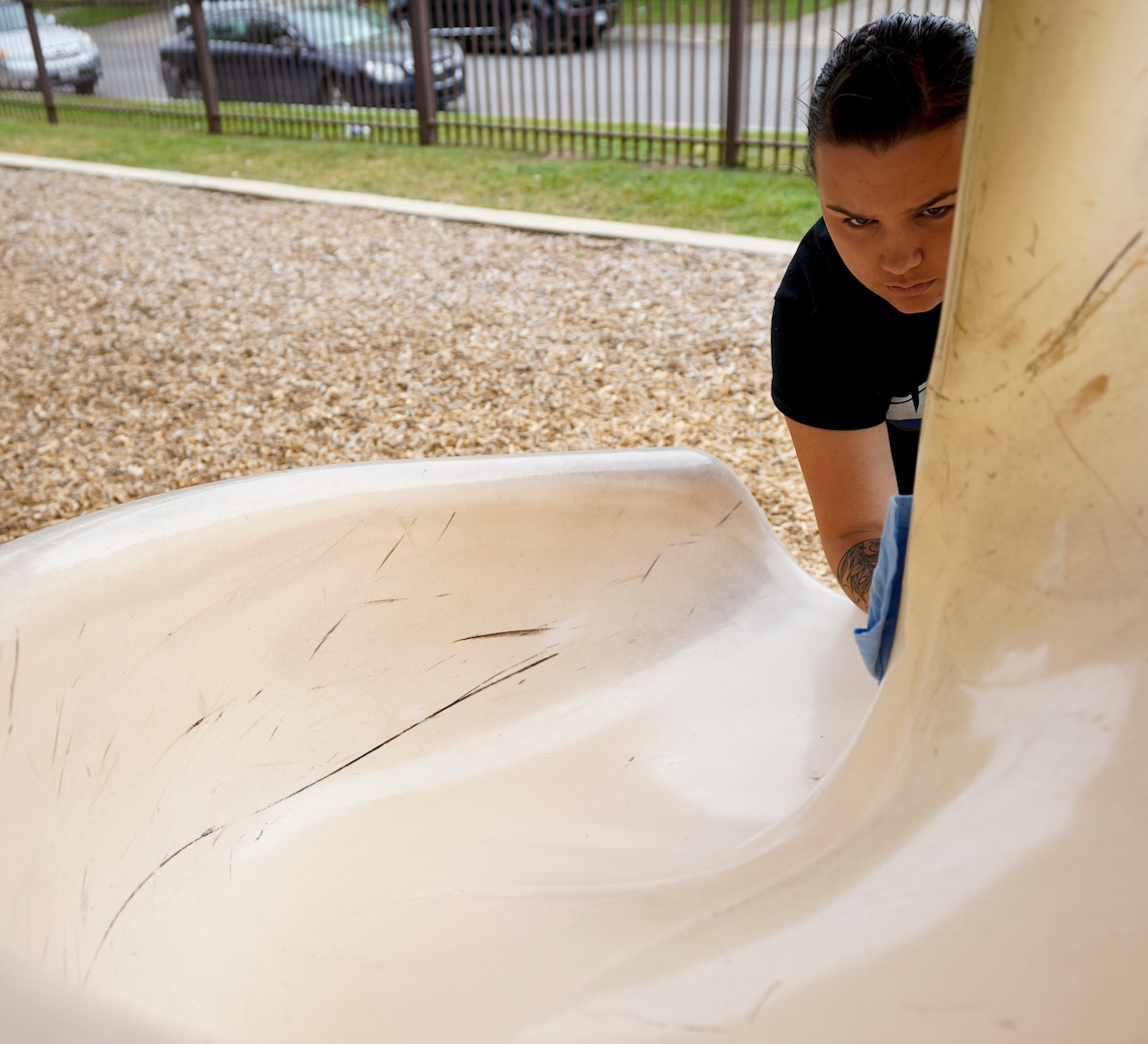 Seaman Apprentice Hailey Johnson, assigned to Navy Medicine Education, Training and Logistics Command at Joint Base San Antonio-Fort Sam Houston, disinfects parts of playground during a community relations event held at Martinez Park during a Sailor 360 event. Sailor 360 is a command-level program for junior enlisted, senior enlisted and junior officers designed to strengthen and develop leadership through COMREL events, classroom discussions and physical training events.