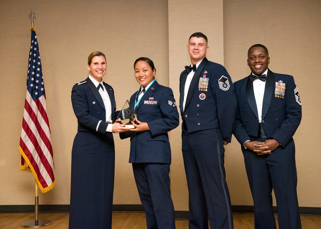 Airmen receive awards from Airman Leadership School (ALS), March 28, 2019, at Moody Air Force Base, Ga. ALS is a 5-week course designed to develop Airmen into effective front-line supervisors by focusing on building leadership abilities, teamwork skills and effective communication. (U.S. Air Force photo by Airman 1st Class Eugene Oliver)
