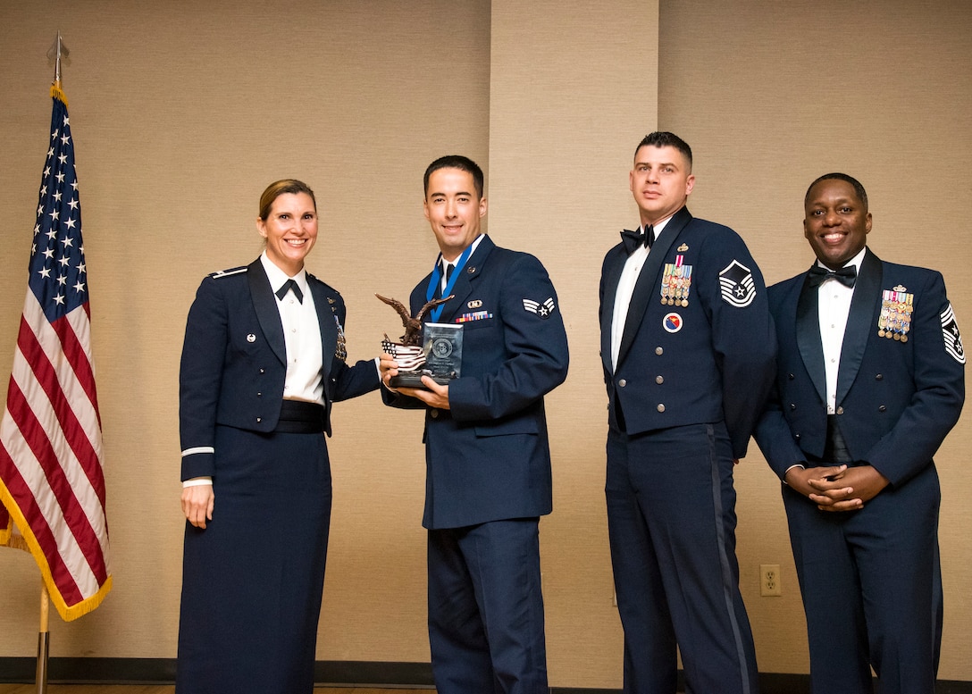 Airmen receive awards from Airman Leadership School (ALS), March 28, 2019, at Moody Air Force Base, Ga. ALS is a 5-week course designed to develop Airmen into effective front-line supervisors by focusing on building leadership abilities, teamwork skills and effective communication. (U.S. Air Force photo by Airman 1st Class Eugene Oliver)