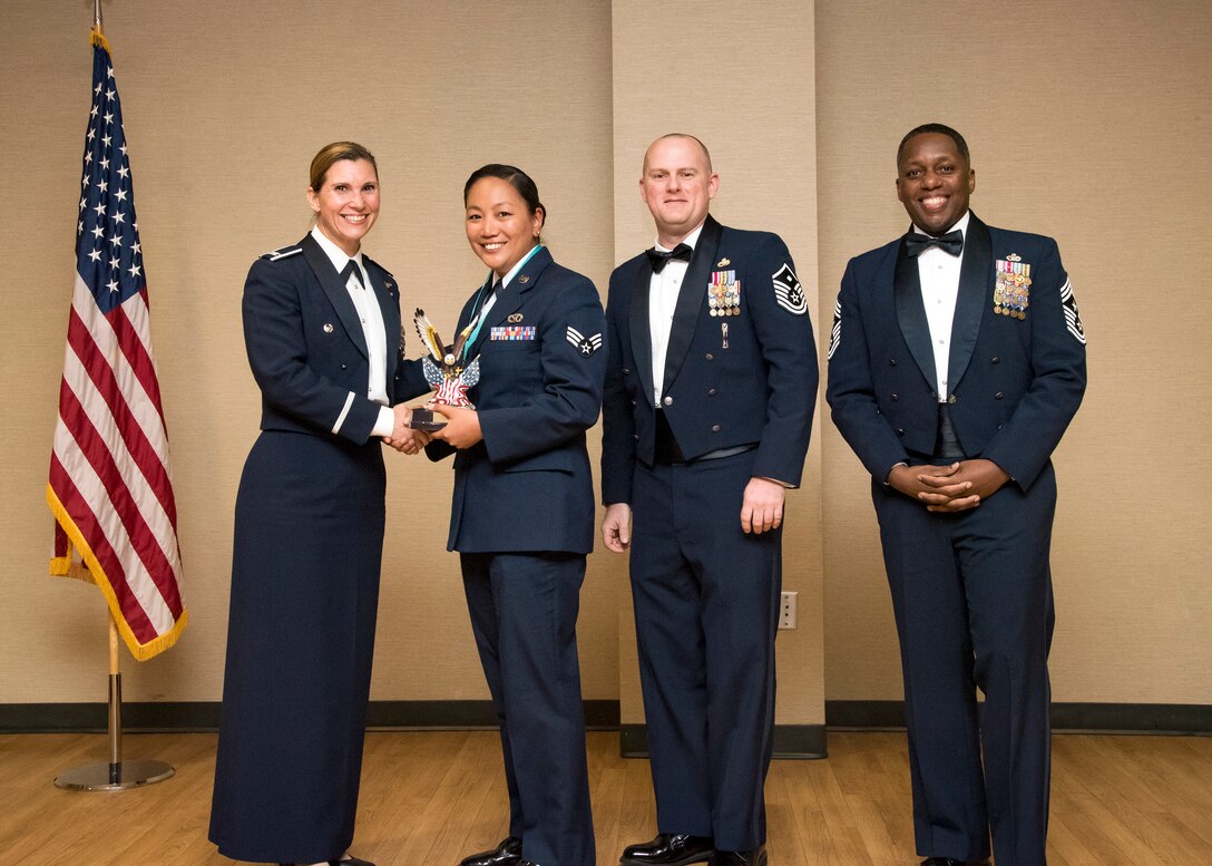 Airmen receive awards from Airman Leadership School (ALS), March 28, 2019, at Moody Air Force Base, Ga. ALS is a 5-week course designed to develop Airmen into effective front-line supervisors by focusing on building leadership abilities, teamwork skills and effective communication. (U.S. Air Force photo by Airman 1st Class Eugene Oliver)