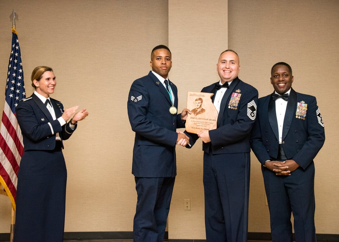 Airmen receive awards from Airman Leadership School (ALS), March 28, 2019, at Moody Air Force Base, Ga. ALS is a 5-week course designed to develop Airmen into effective front-line supervisors by focusing on building leadership abilities, teamwork skills and effective communication. (U.S. Air Force photo by Airman 1st Class Eugene Oliver)