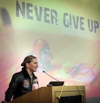Lt. Rebecca Shaw, U.S. Navy Test Pilot and project officer attached to Air Test and Evaluation Squadron (VX) 20 at Naval Air Station Patuxent River, Maryland speaks during the morning keynote address to the March 26 "Sustaining the Momentum: Women in Leadership for the Next Decade" symposium at the College of Southern Maryland. (U.S. Navy photo by Matthew Poynor)