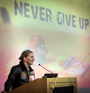 Lt. Rebecca Shaw, U.S. Navy Test Pilot and project officer attached to Air Test and Evaluation Squadron (VX) 20 at Naval Air Station Patuxent River, Maryland speaks during the morning keynote address to the March 26 "Sustaining the Momentum: Women in Leadership for the Next Decade" symposium at the College of Southern Maryland. (U.S. Navy photo by Matthew Poynor)