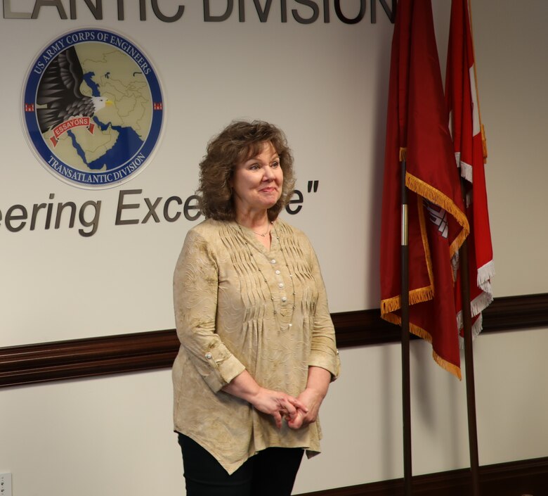 Transatlantic Division employee Joan Kibler gives an emotional farewell speech on the occasion of her “re-retirement” March 19, 2019, after 40 years in public service.