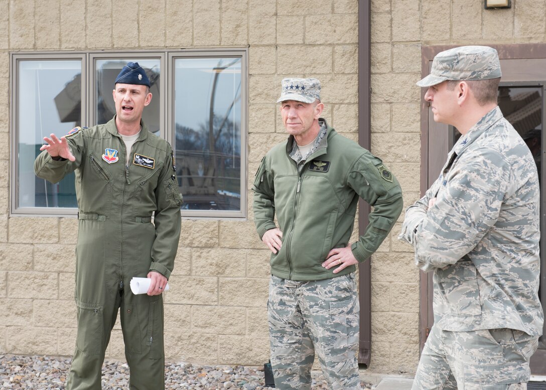 U.S. Air Force Lt. Col. Jay Labrum, 266th Range Squadron commander, talks to U.S. Air Force Gen. Mike Holmes, commander of Air Combat Command, about the jamming equipment that the squadron’s Cowboy Control division uses, March 27, 2019, at Mountain Home Air Force Base, Idaho. Holmes visited MHAFB to view the innovative projects of squadrons on base. (U.S. Air Force photo by Senior Airman Tyrell Hall)