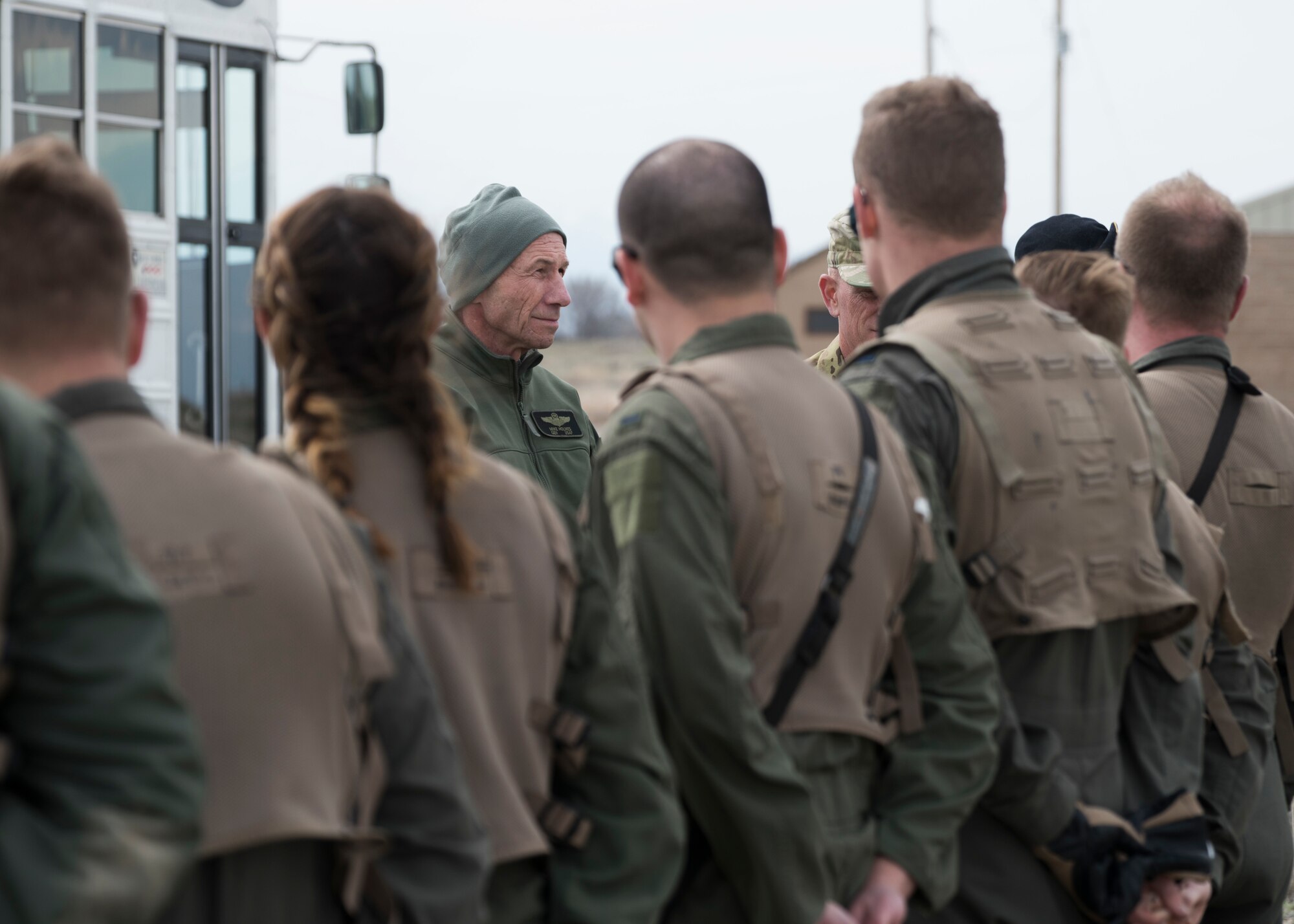 U.S. Air Force Gen. Mike Holmes, commander of Air Combat Command, meets Airmen during a shoot, move, communicate course March 27, 2019, at the gun-range on Mountain Home Air Force Base, Idaho.  Holmes met with several squadrons within the wing to discuss innovative ideas from Gunfighters and the importance of the base-wide reorganization plan. (U.S. Air Force photo by Airman 1st Class Andrew Kobialka)