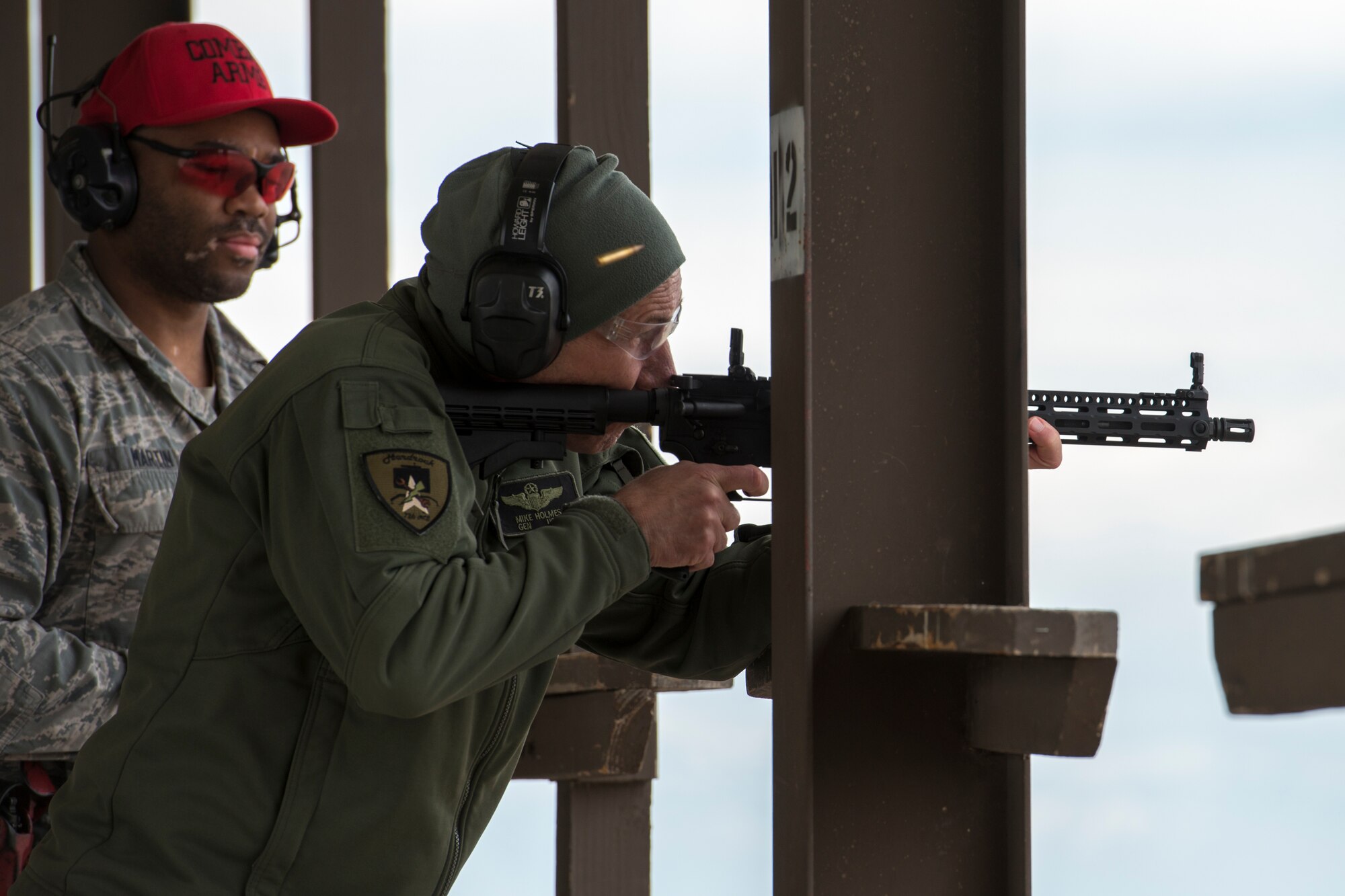 U.S. Air Force Gen. Mike Holmes, commander of Air Combat Command, fires a GAU-5 during a shoot, move, communicate course March 27, 2019, at the gun-range on Mountain Home Air Force Base, Idaho. The GAU-5 is a semi-automatic stand-off rifle that pilots carry with their ejection survival packs. (U.S. Air Force photo by Airman 1st Class JaNae Capuno)