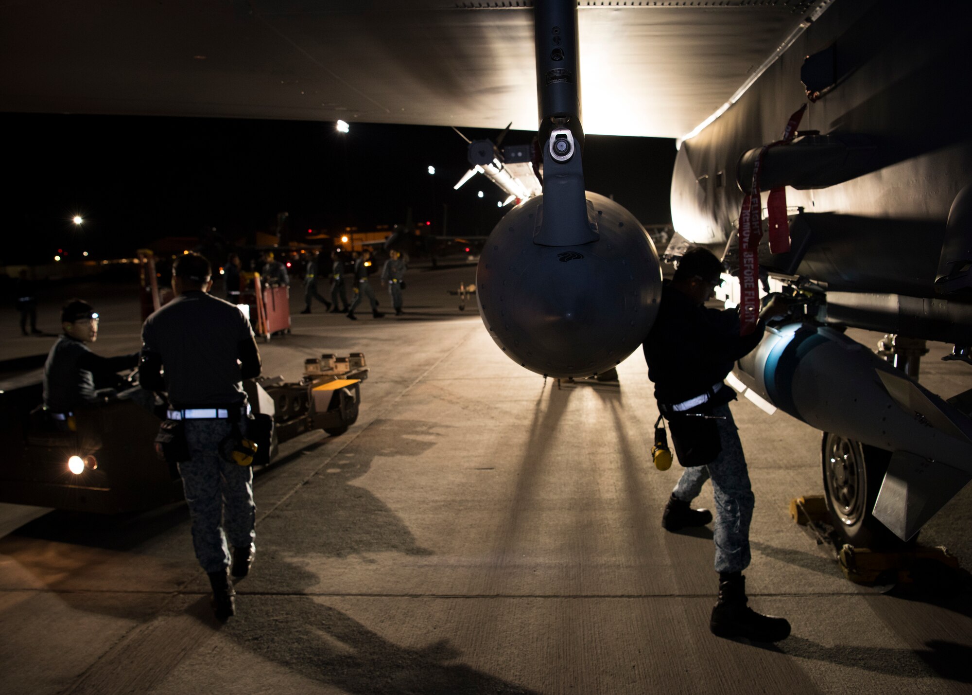 Airmen from the 428th Fighter Squadron load an inert bomb March 18, 2019, at the Red Flag exercise on Nellis Air Force Base, Nevada. Red flag is the world’s premiere air-to-air combat training exercise. (U.S. Photo by Airman First Class Andrew Kobialka)