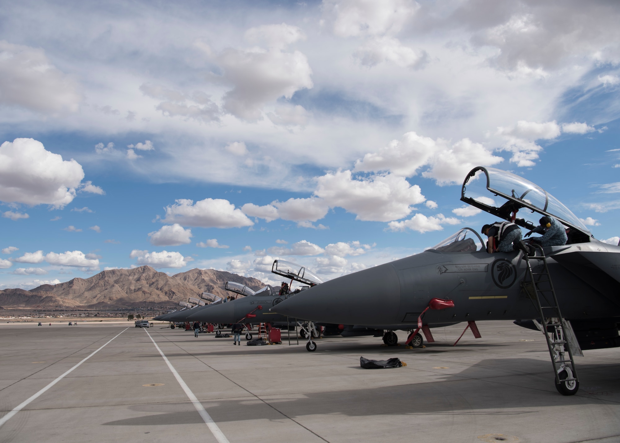 Airmen from the 428th Fighter Squadron inspect their F-15SG Strike Eagle post-flight March 21, 2019, at the Red Flag exercise on Nellis Air Force Base, Nevada. Red flag is the world’s premiere air-to-air combat training exercise. (U.S. Photo by Airman First Class Andrew Kobialka)