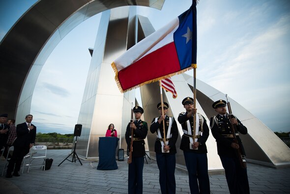 Students from John F. Kennedy High School ROTC participate during the Freedom sculpture grand opening, Mar. 27, 2019, at the corner of U.S. Highway 90 and Military Drive.