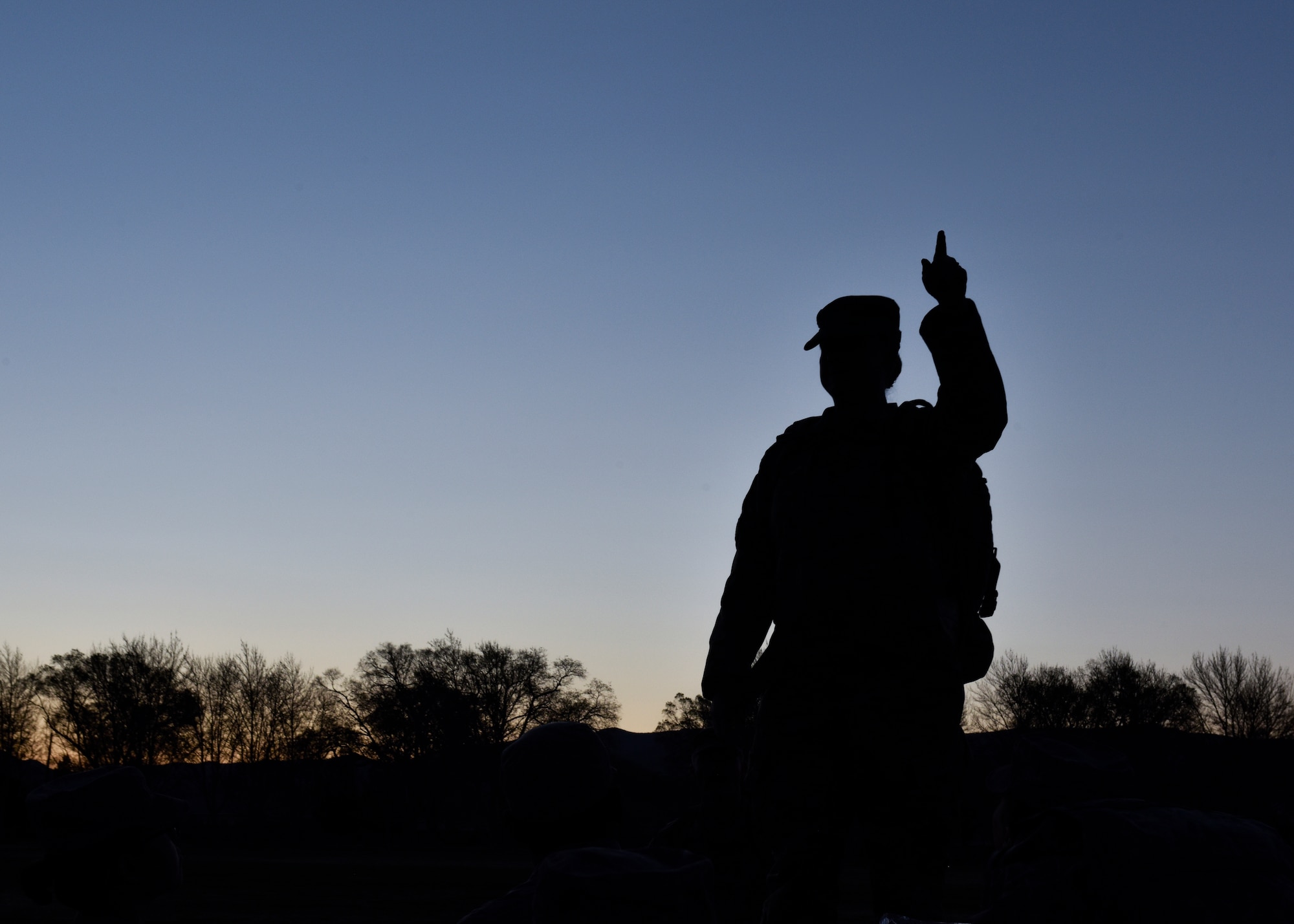 U.S. Air Force Master Sgt. Heather Geer, 377th Security Forces Squadron Plans and Programs superintendent, gives directions at Kirtland Air Force Base, N.M., March 29, 2019. The 377th Security Forces Squadron Suicide Awareness Ruck March was created to support The Brave Badge Initiative Facebook page. The Facebook page was created due to the increased rates in suicide in the security forces career field in the past year and aims to give Defenders another place to go to when they are struggling with mental health issues.  (U.S. Air Force photo by Airman 1st Class Austin J. Prisbrey)